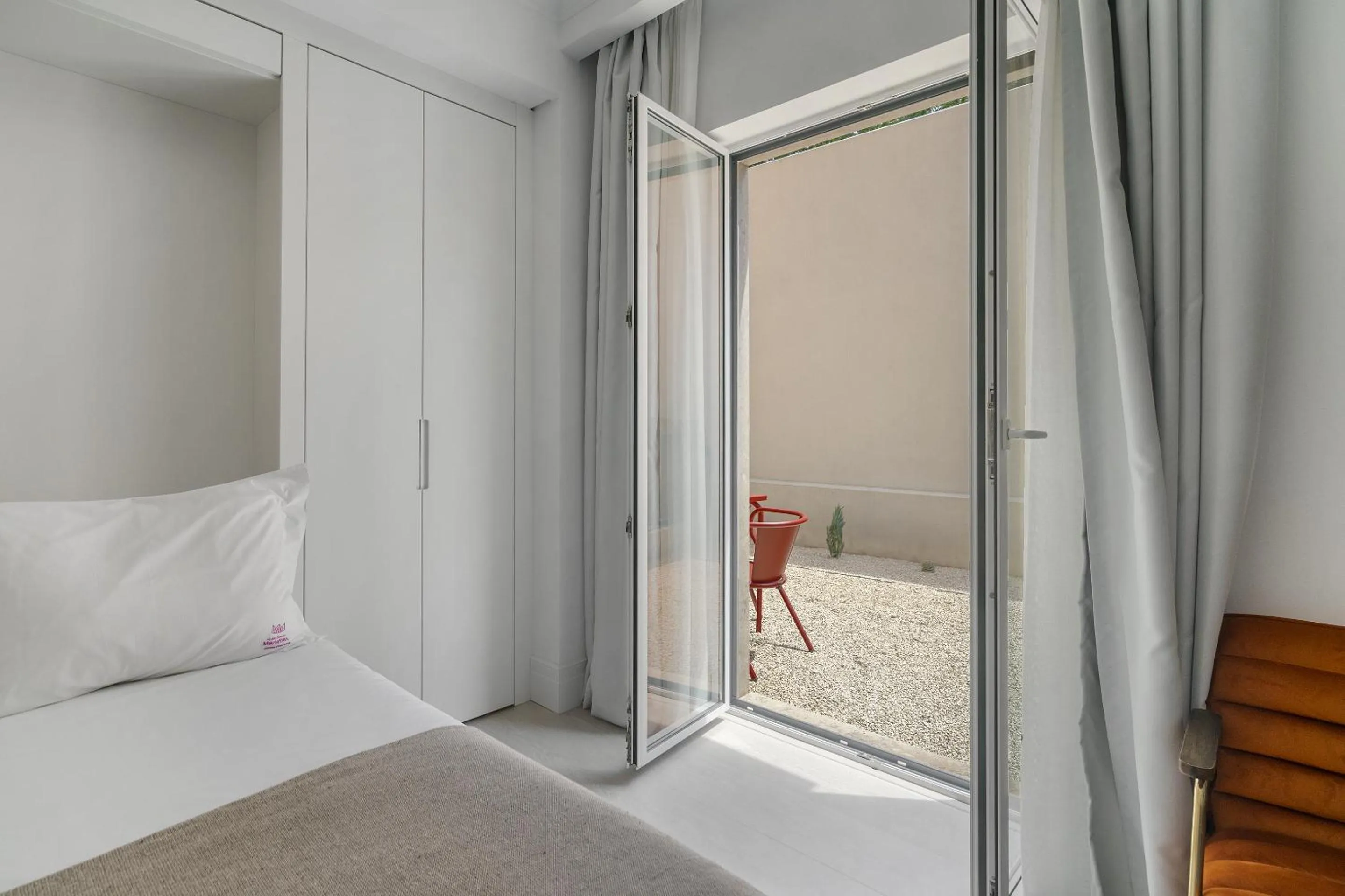 Bed in Les Deux Mariettes Apartments & Suites