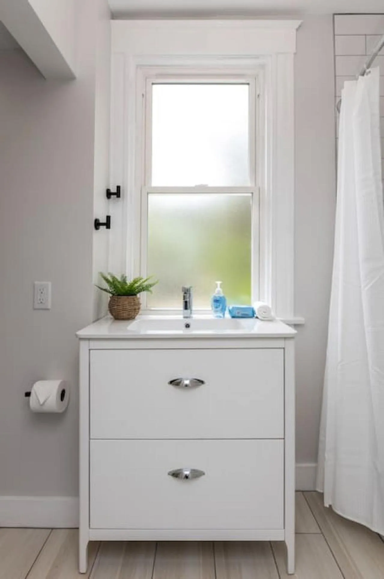 Bathroom in Deluxe 4-Bedroom w Huge Deck 3-Min to Downtown