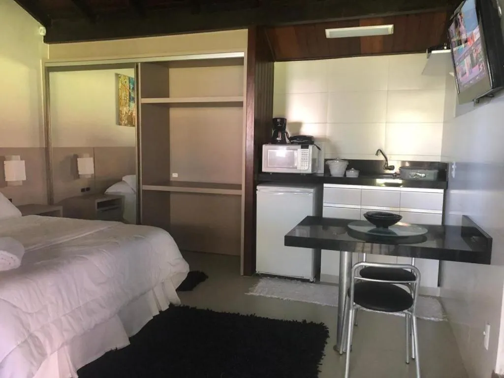 Bed in Pousada Solar dos Girassóis