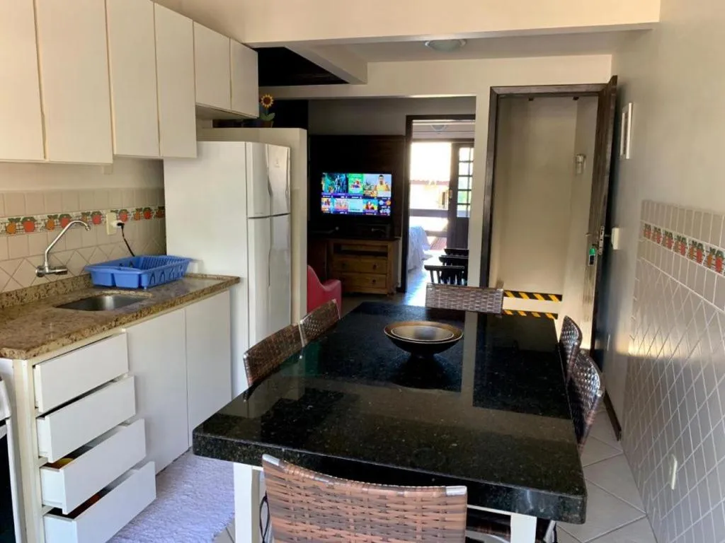 Kitchen or kitchenette in Pousada Solar dos Girassóis