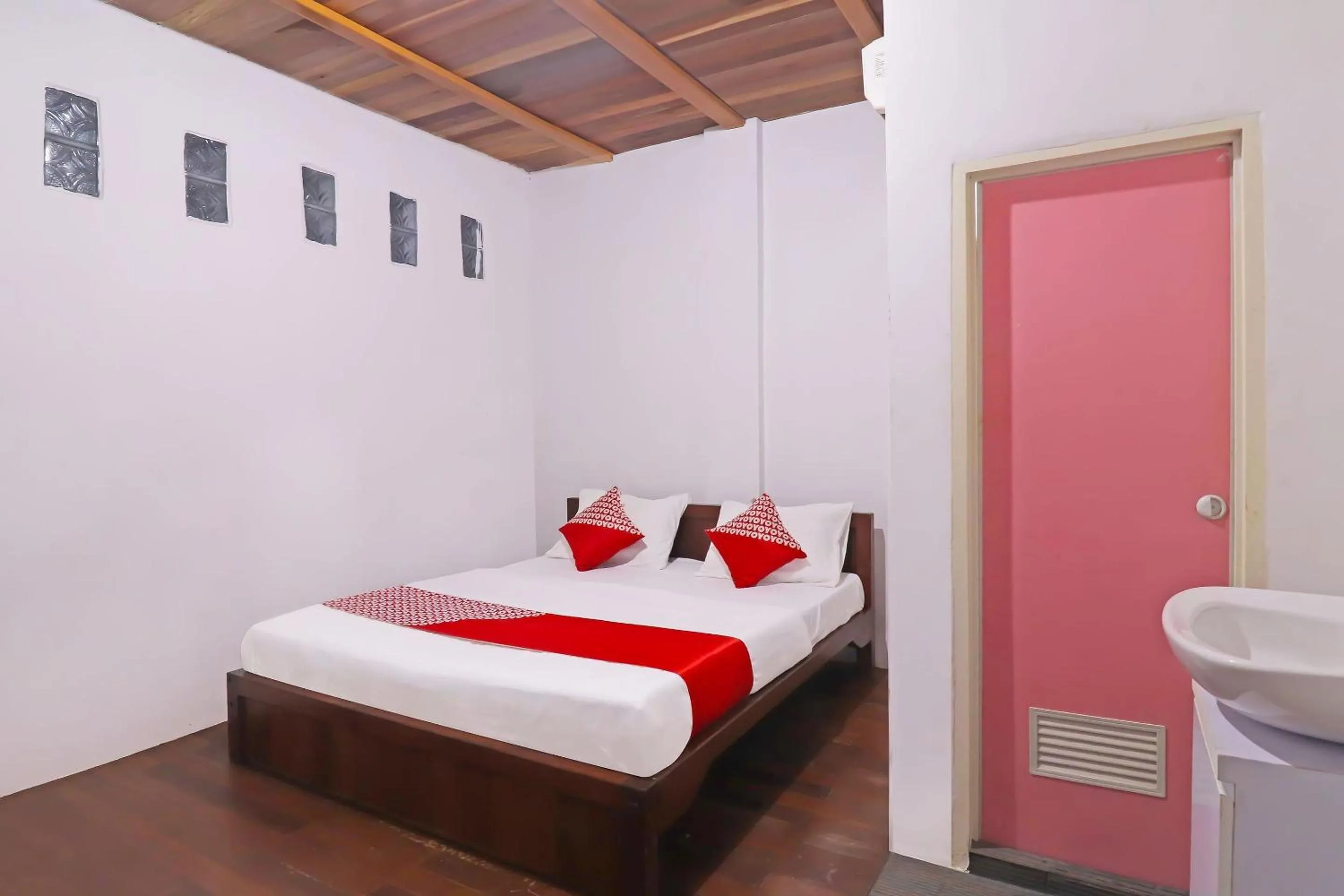 Bedroom in OYO 91807 Kemalasari Guesthouse