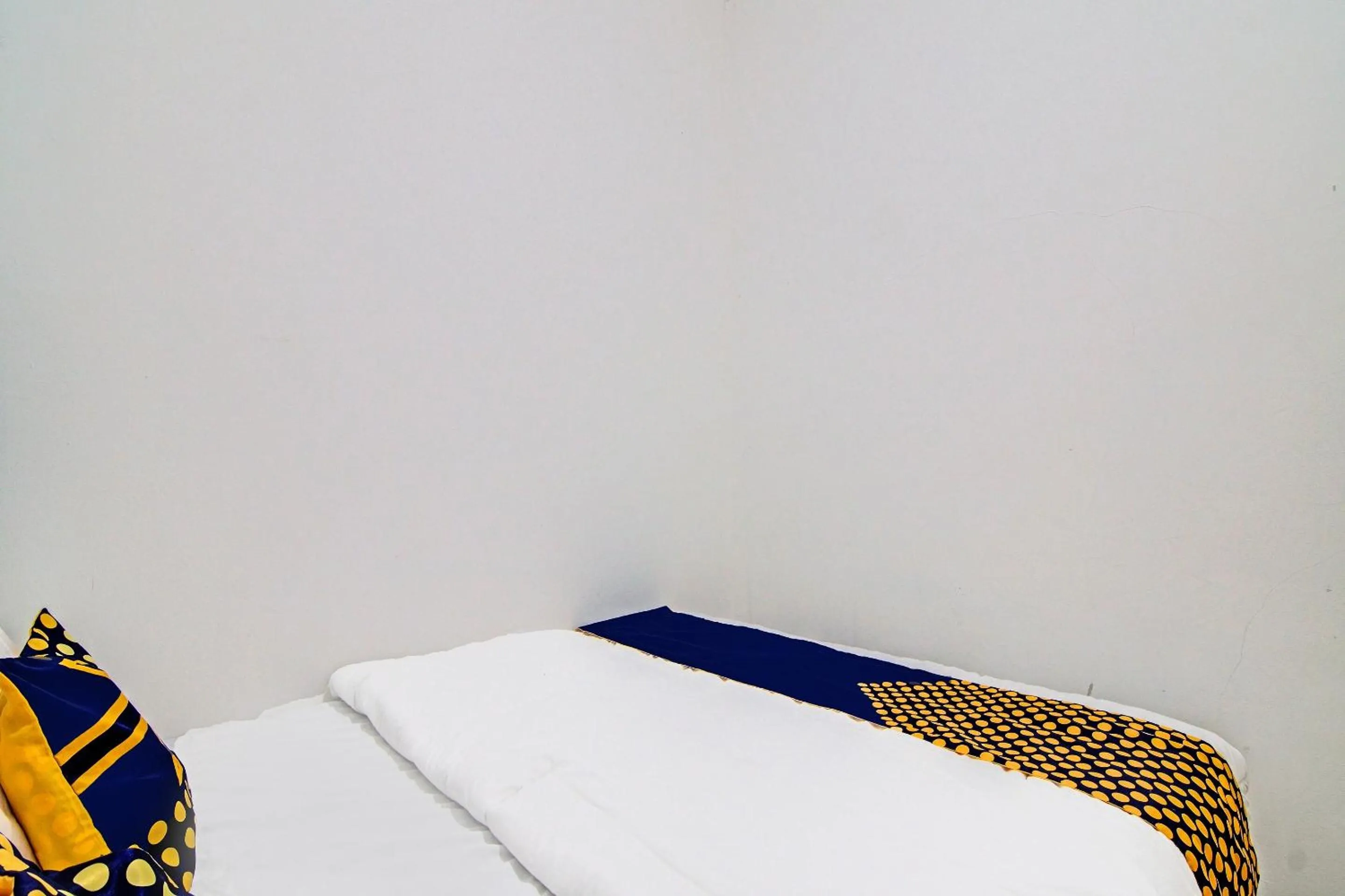 Bedroom in Hotel O Homestay Dinda Syariah Near Masjid Al Amin