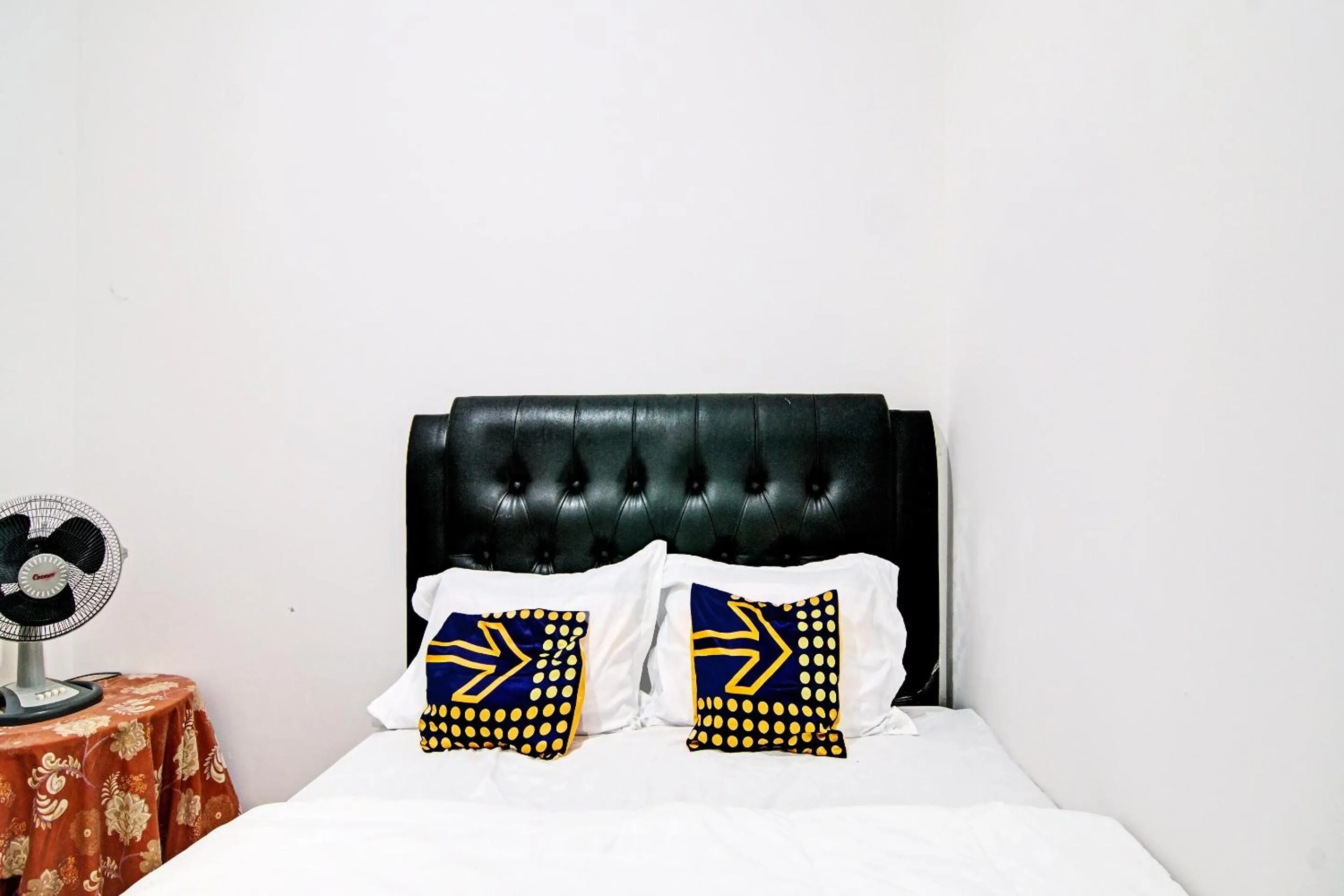 Bedroom in Hotel O Homestay Dinda Syariah Near Masjid Al Amin