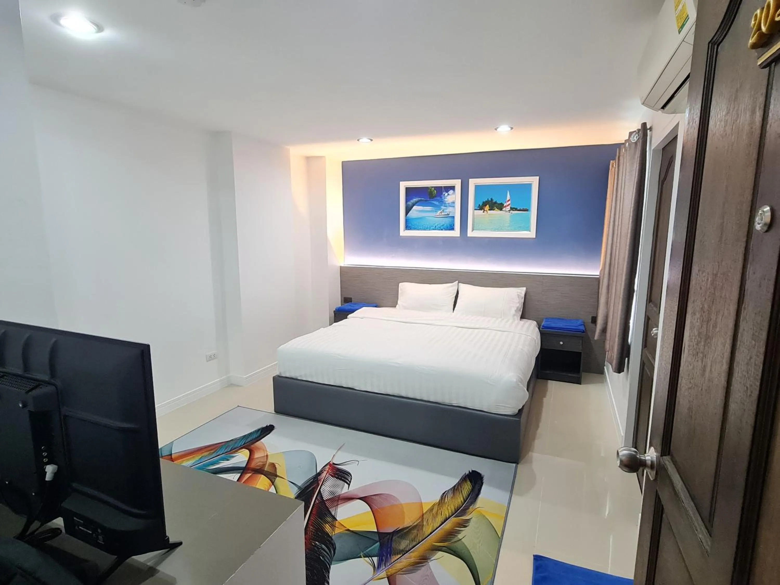 Bed in Poonsuk Place Hotel