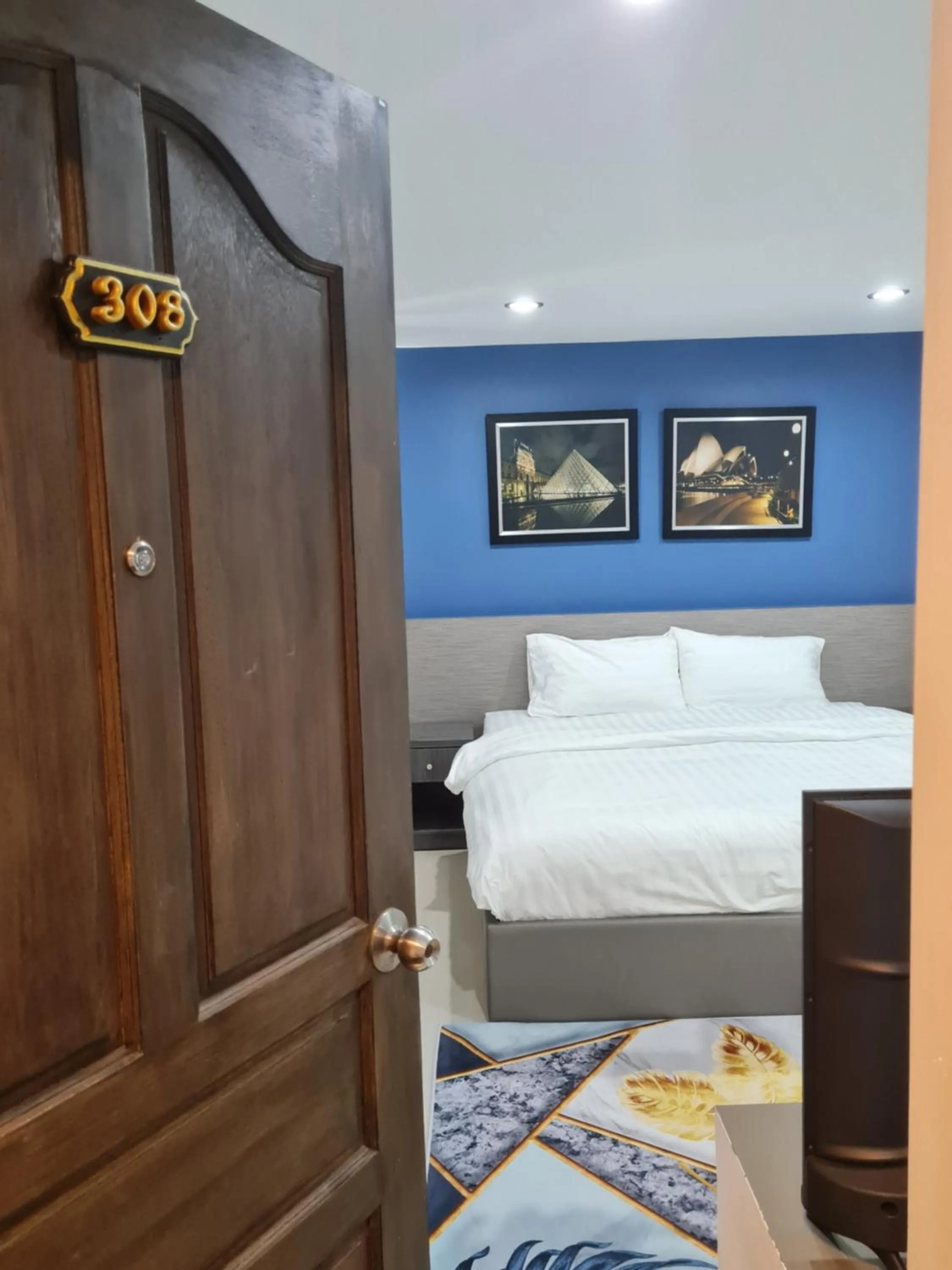 Bed in Poonsuk Place Hotel