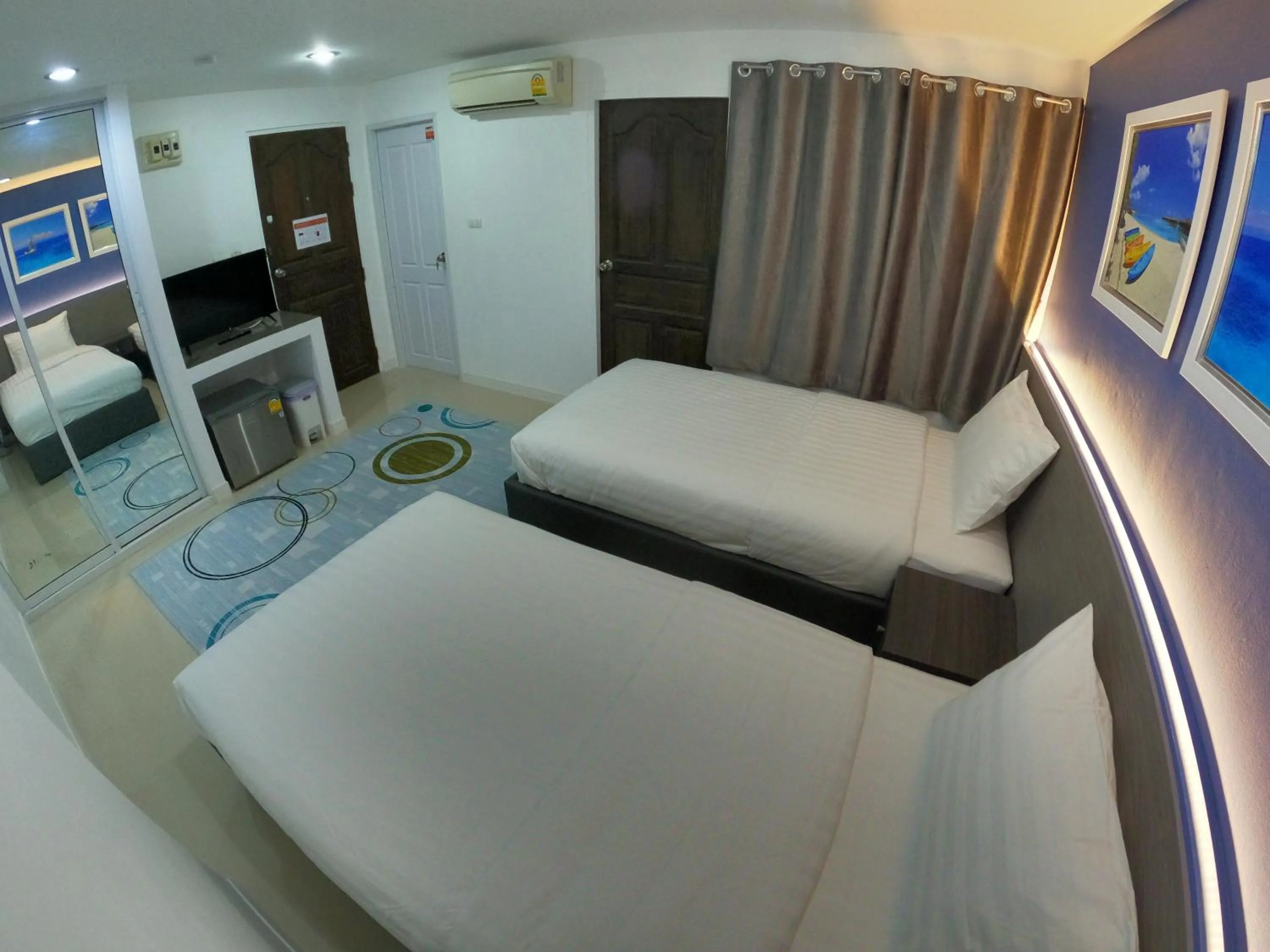 Bed in Poonsuk Place Hotel