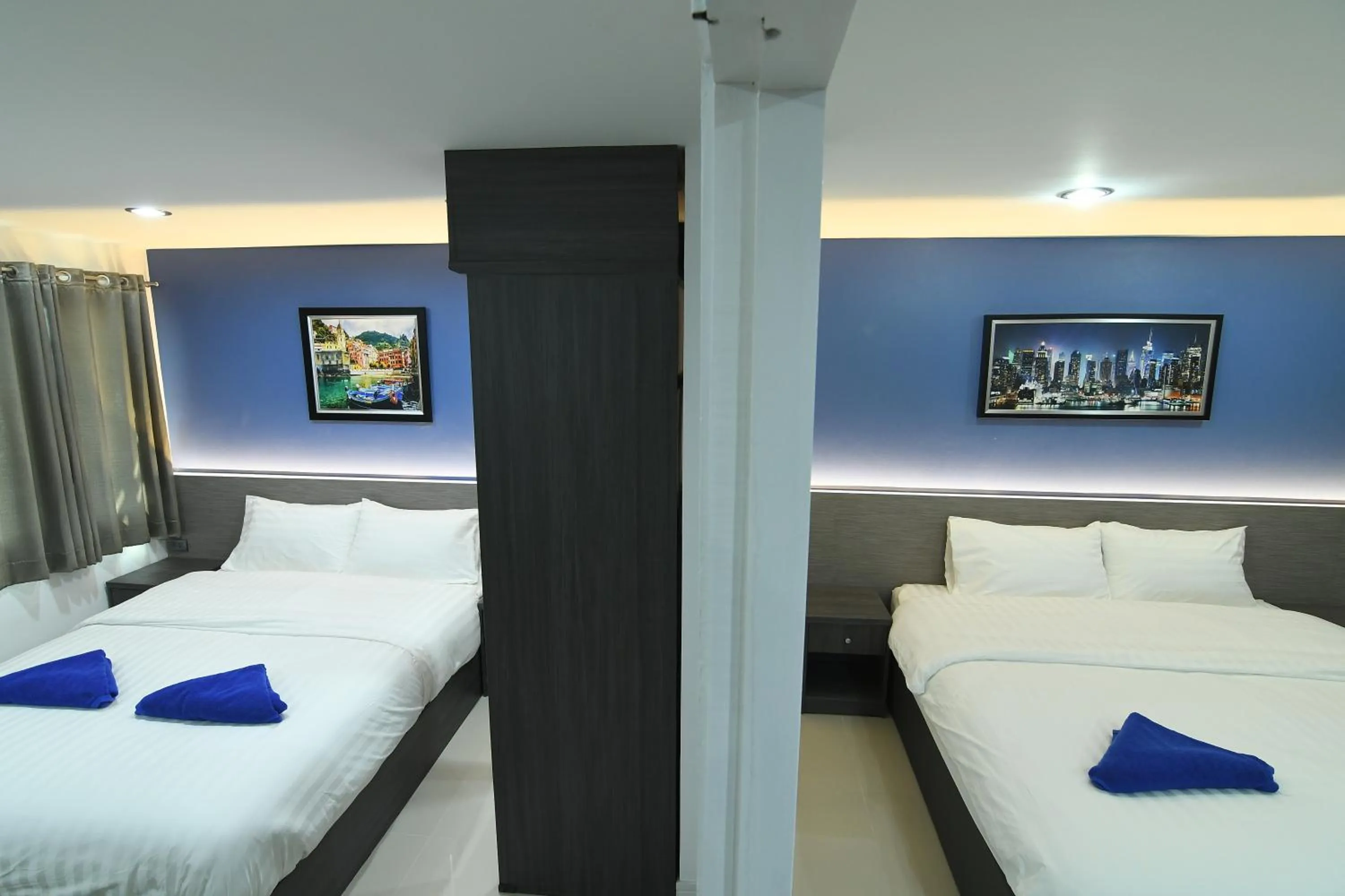 Bed in Poonsuk Place Hotel