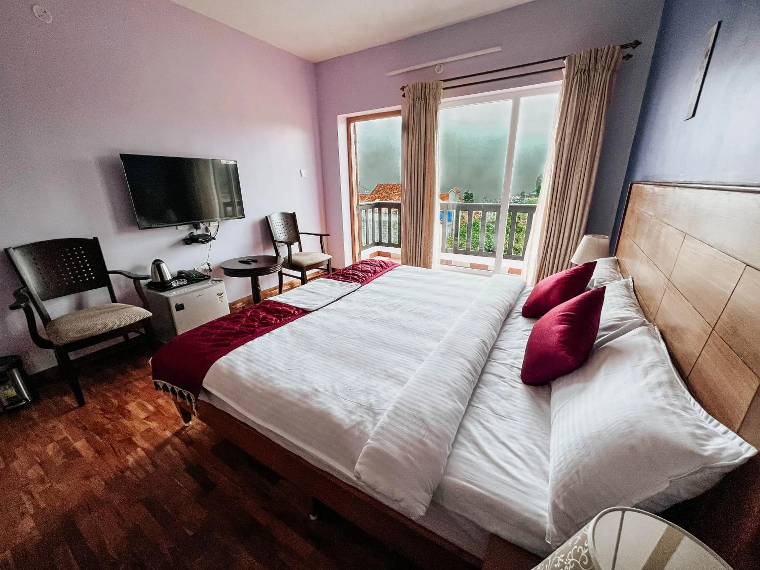 Bed in PURPLE ORCHID BY XACRO XPERIENCES