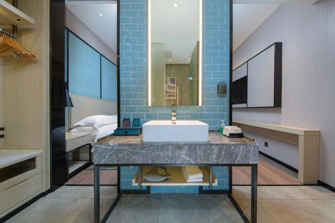 Bed in Echarm Hotel Foshan Guangfo Road Jiaokou Metro Station