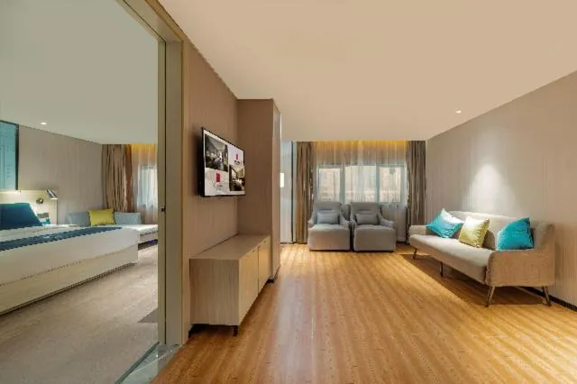 Bed in Echarm Hotel Foshan Guangfo Road Jiaokou Metro Station