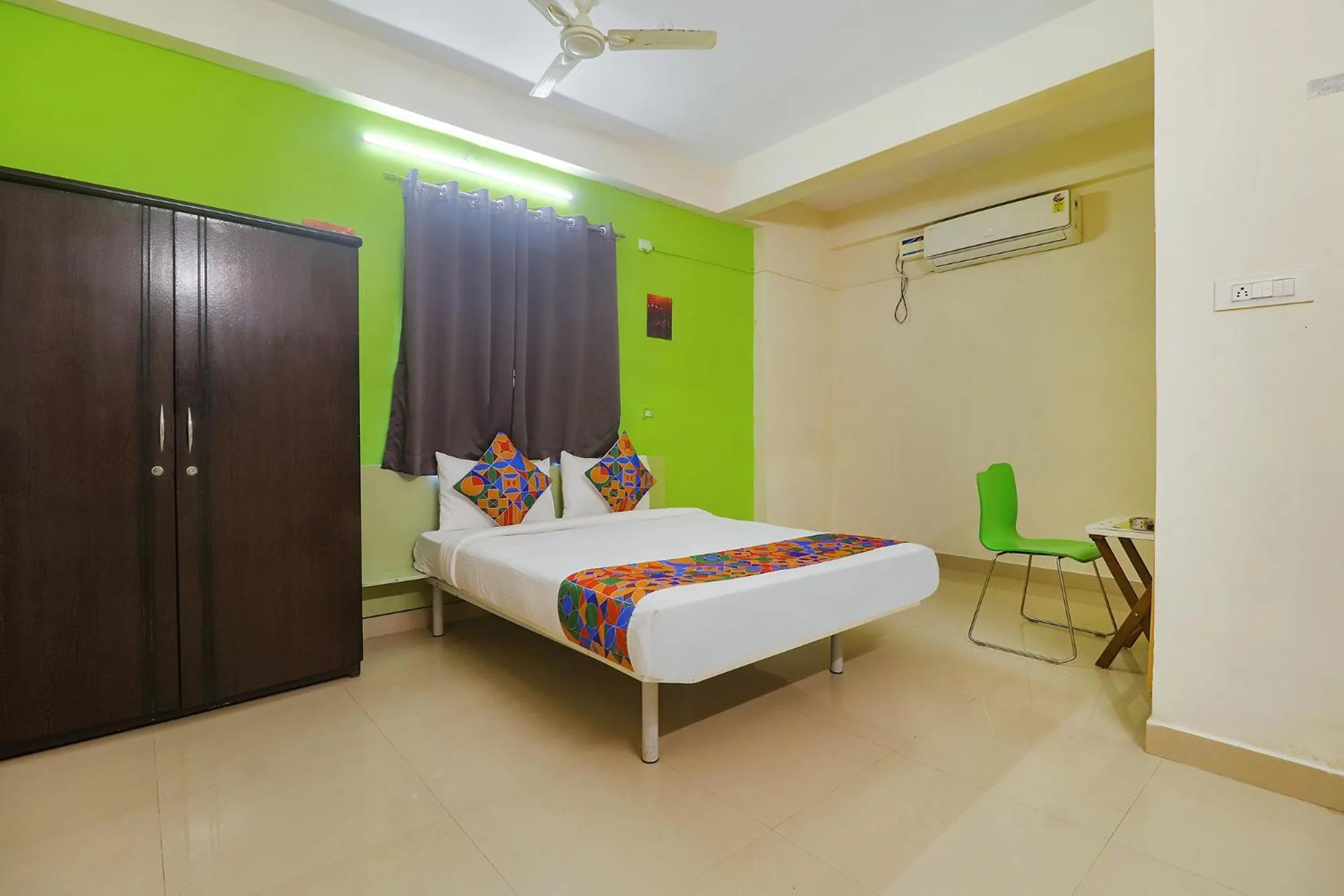 Photo of the whole room, Bed in FabHotel Broholic - Nr Biodiversity Complex, Gachibowli, Silpa Gram Craft Village, HITEC City