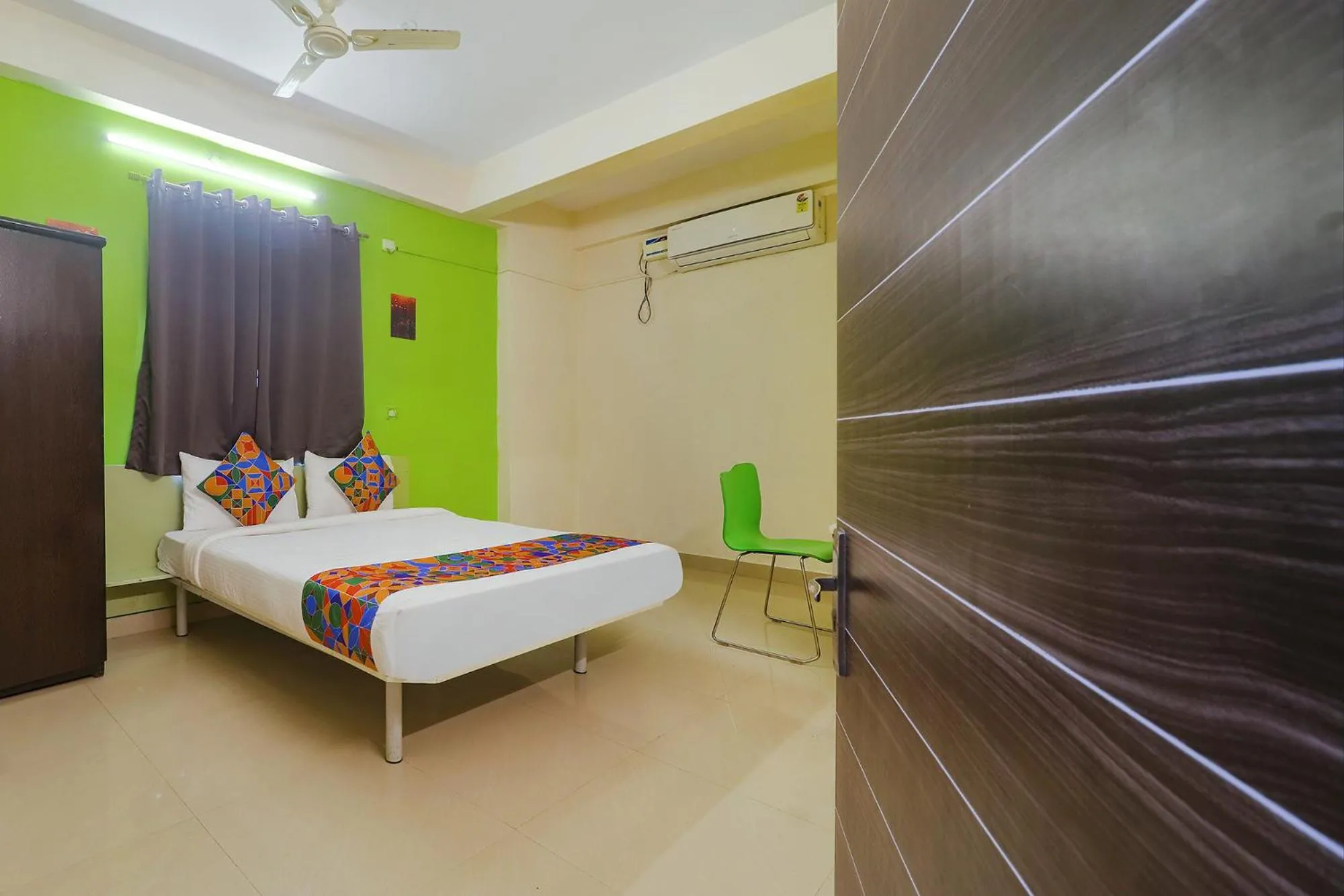 Photo of the whole room, Bed in FabHotel Broholic - Nr Biodiversity Complex, Gachibowli, Silpa Gram Craft Village, HITEC City