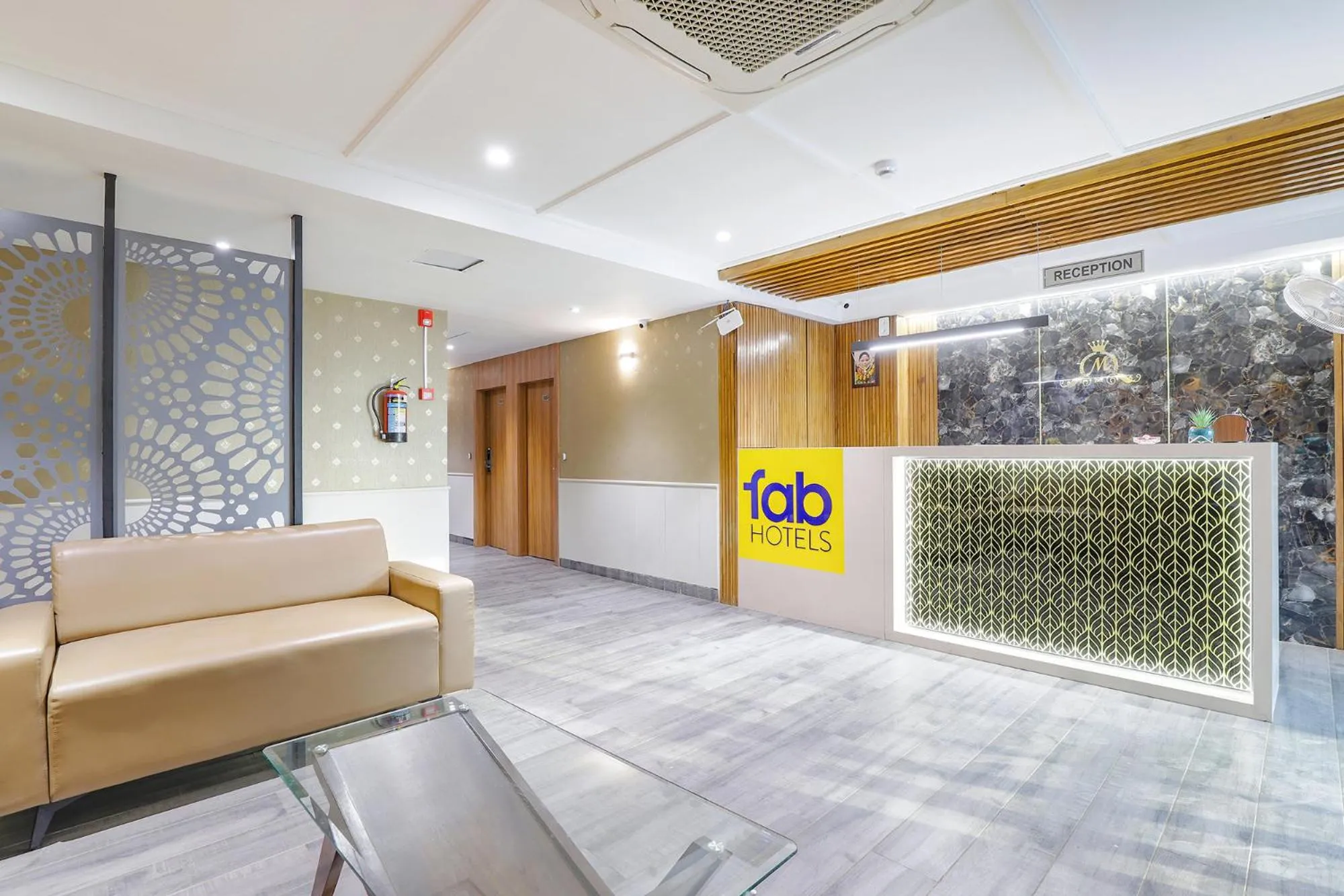 Lobby or reception in FabHotel Meritus Inn