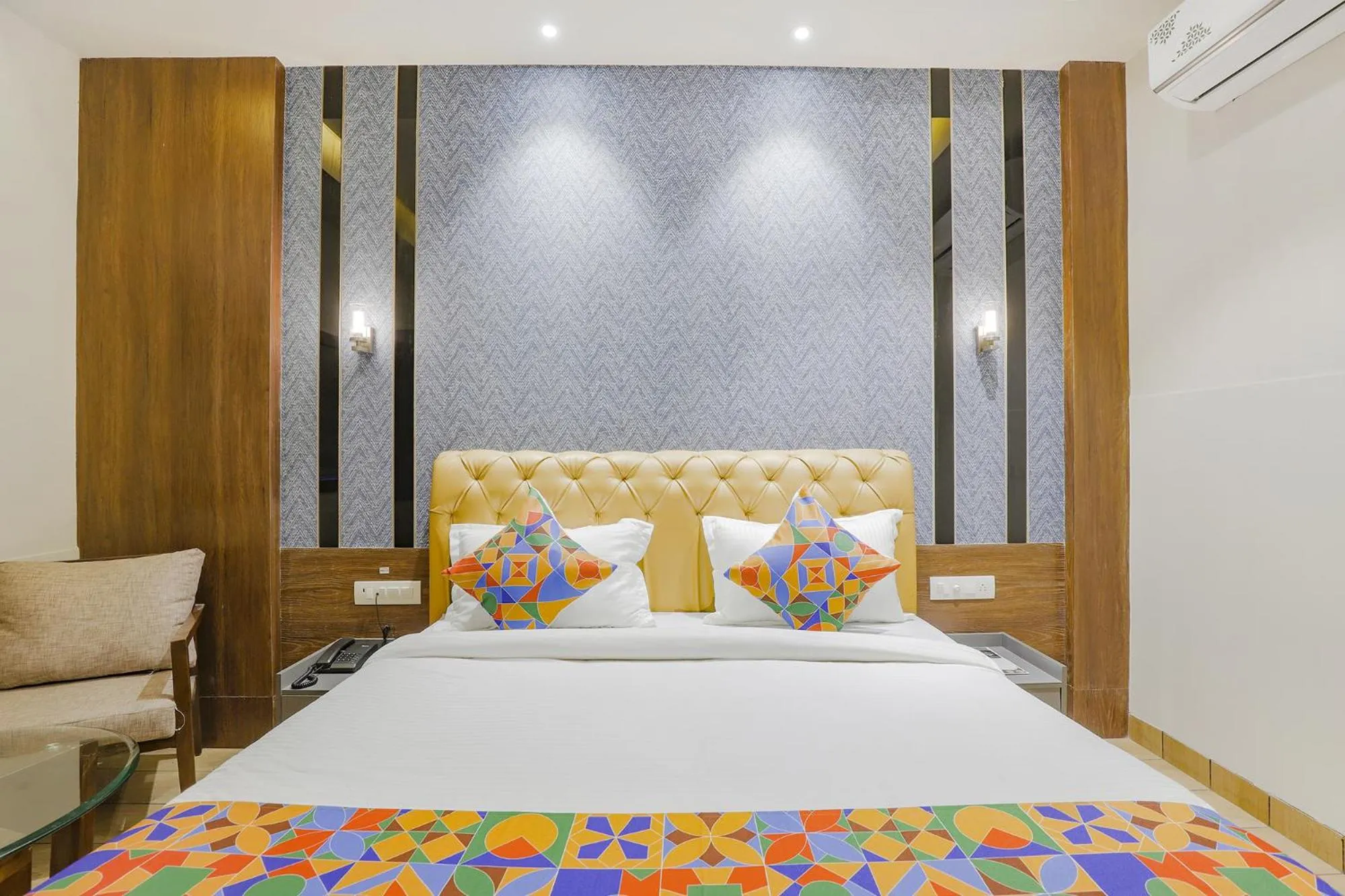 Bed in FabHotel Meritus Inn