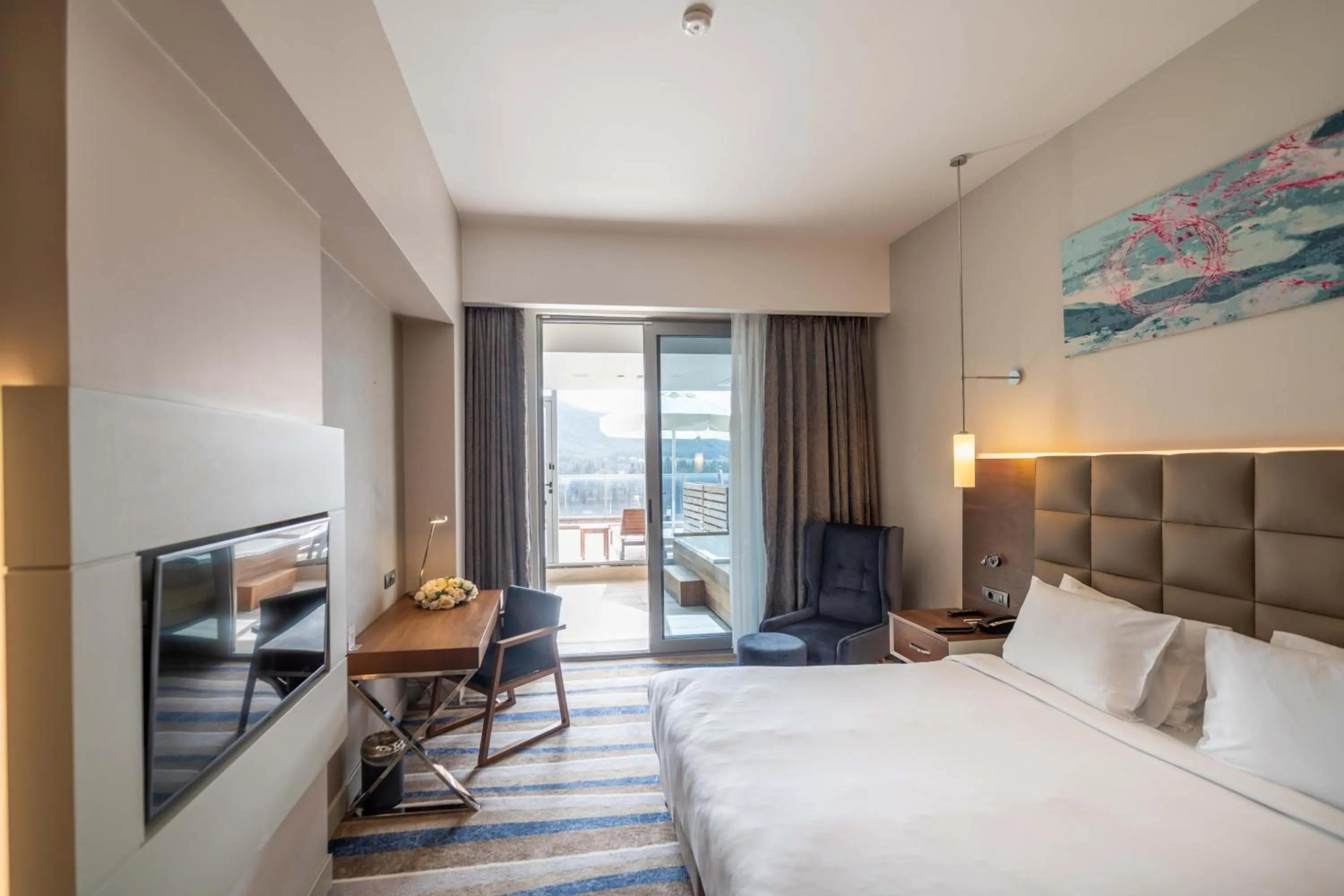 Seating area, Bed in Questa Thermal & Spa Hotel