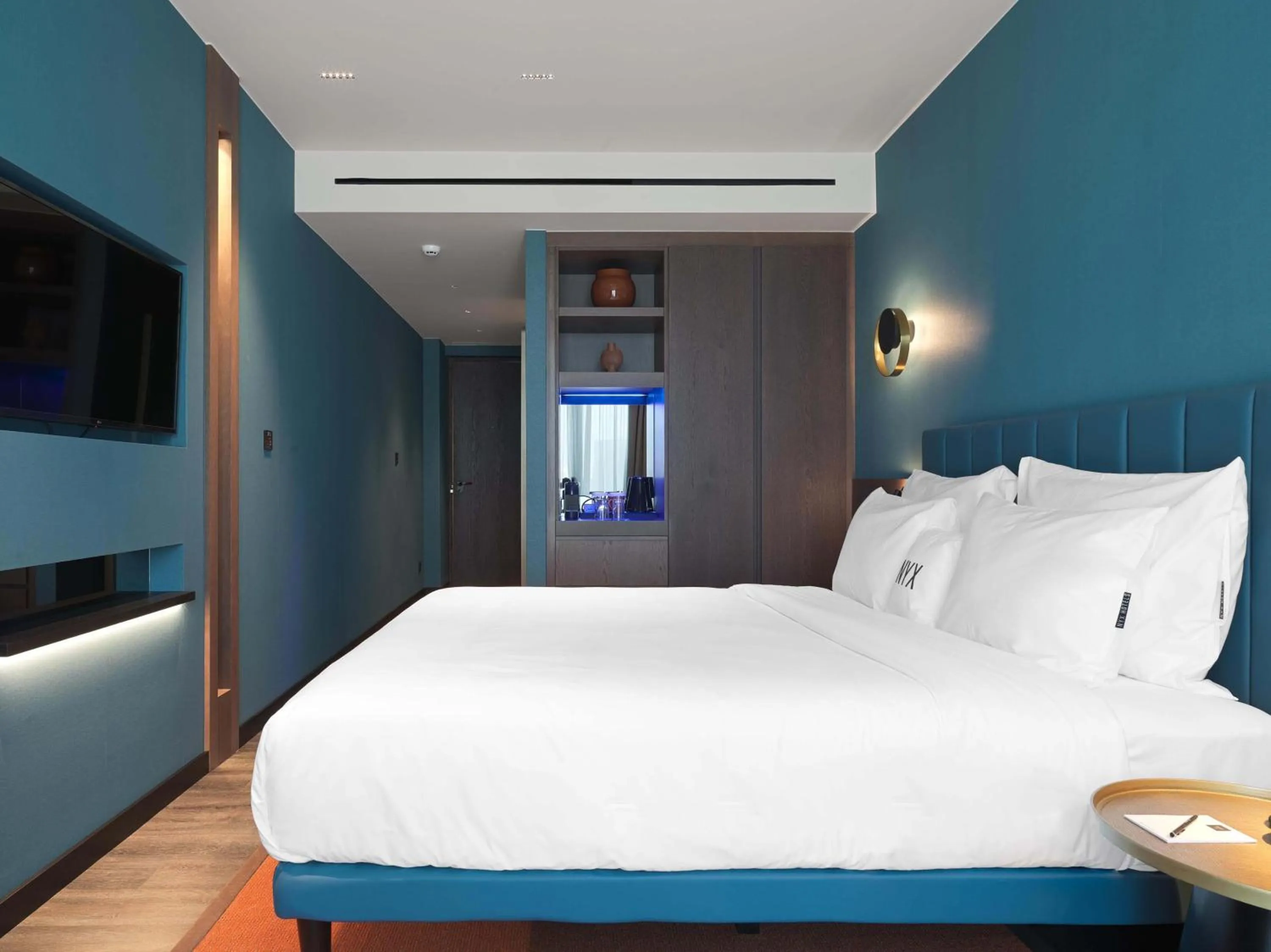 Bed in NYX Esperia Palace Hotel Athens by Leonardo Hotels