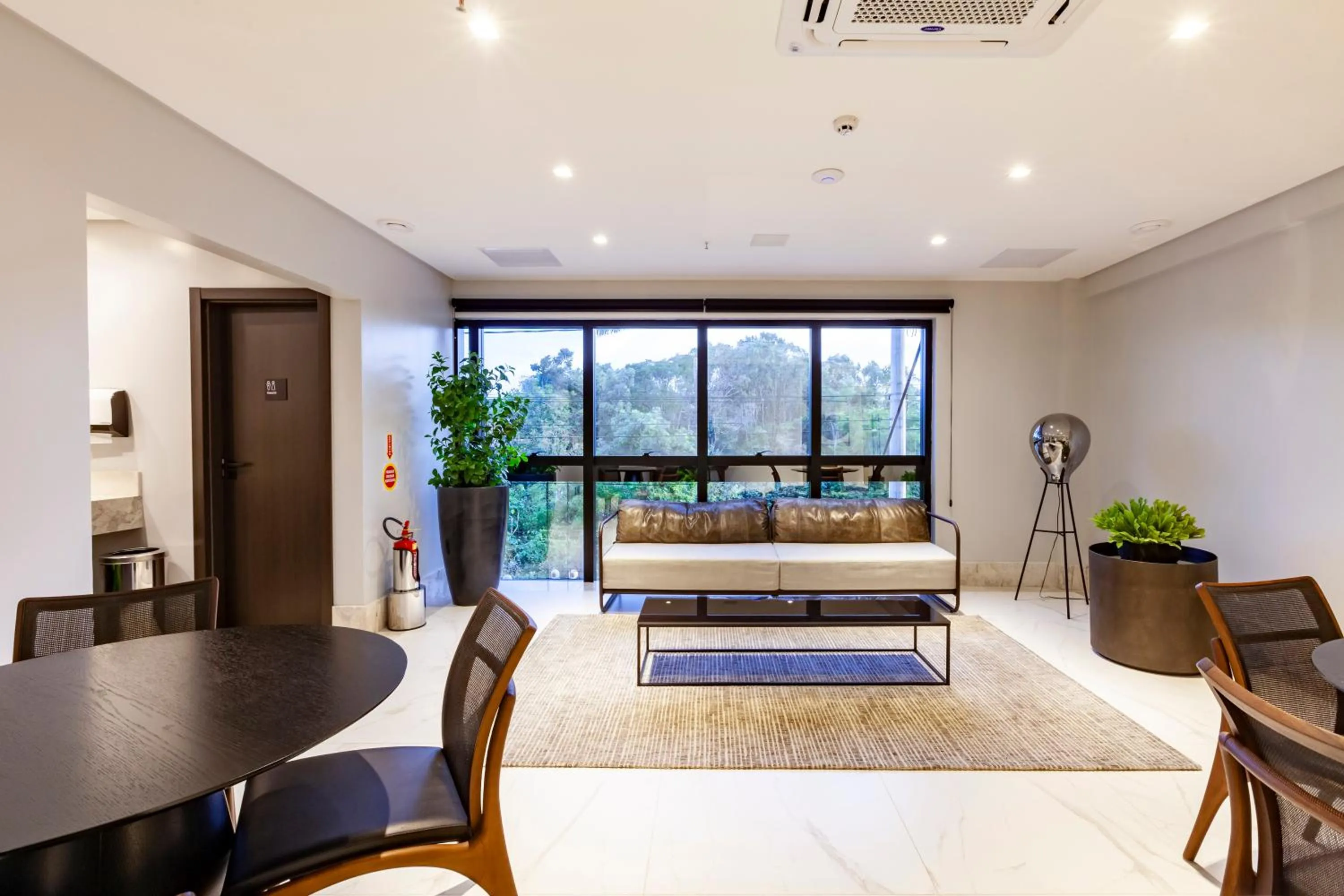 Communal lounge/ TV room in Intercity Itapema