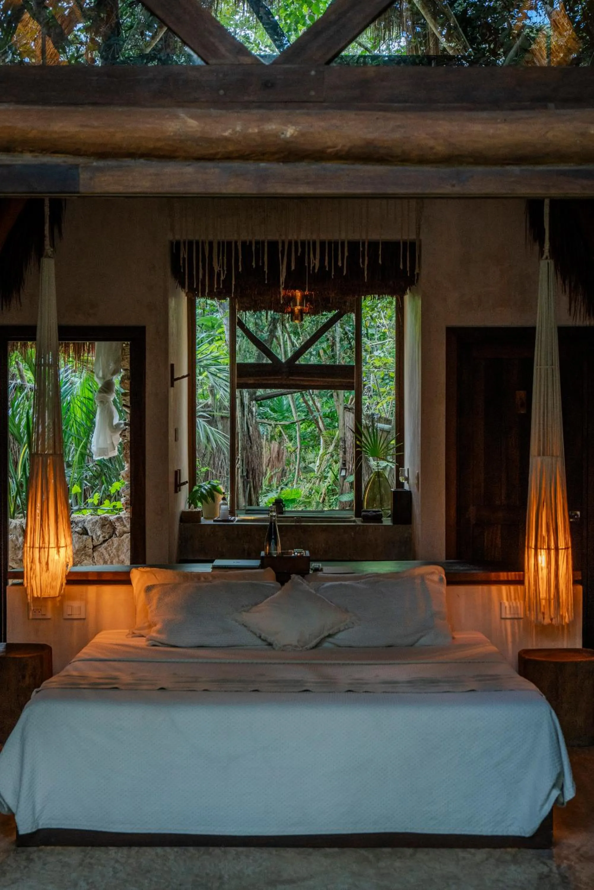 Bed in Naya Bacalar Lagoon Front Hotel