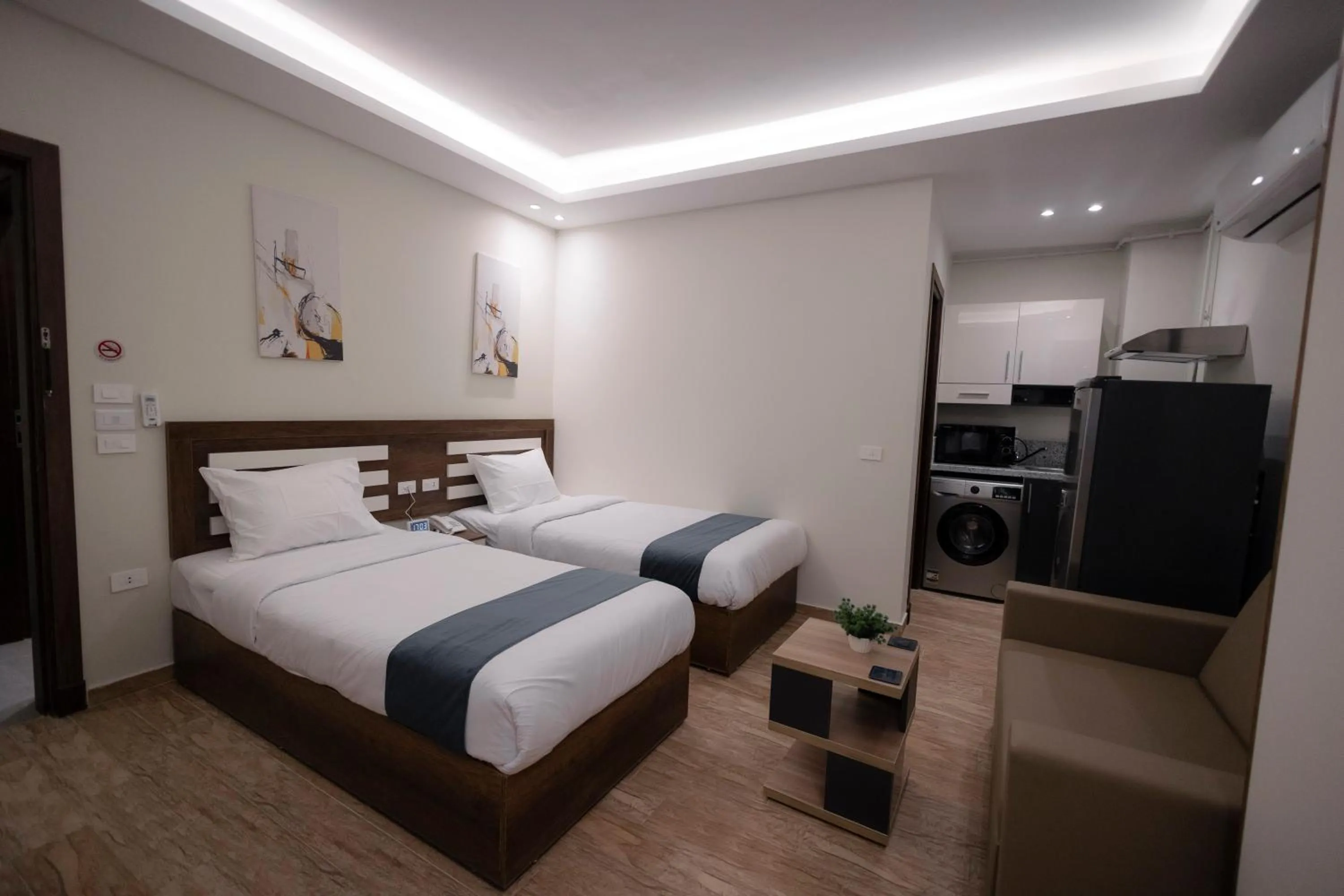 Kitchen or kitchenette, Bed in Royal Inn Residence New Cairo