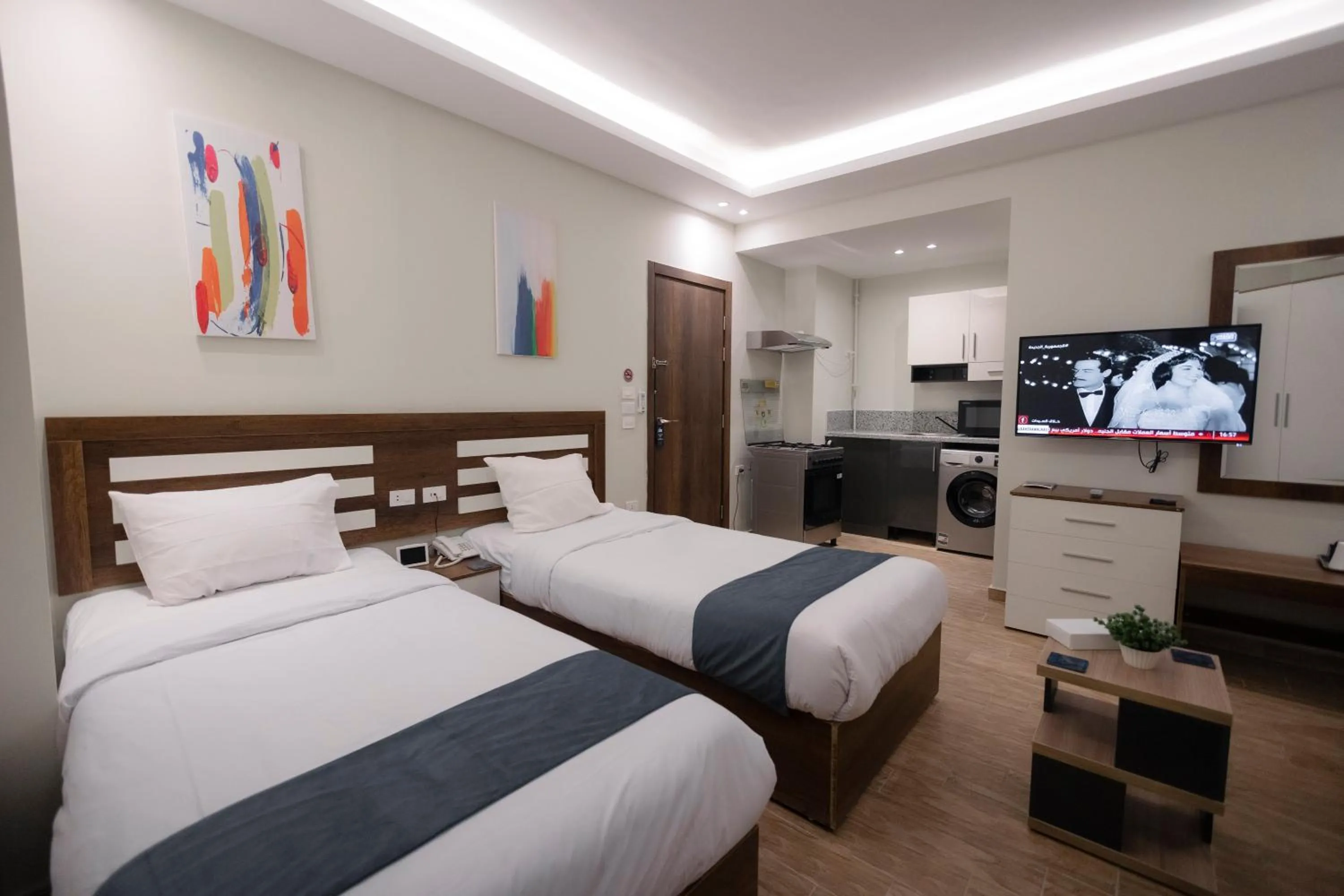 Kitchen or kitchenette, Bed in Royal Inn Residence New Cairo