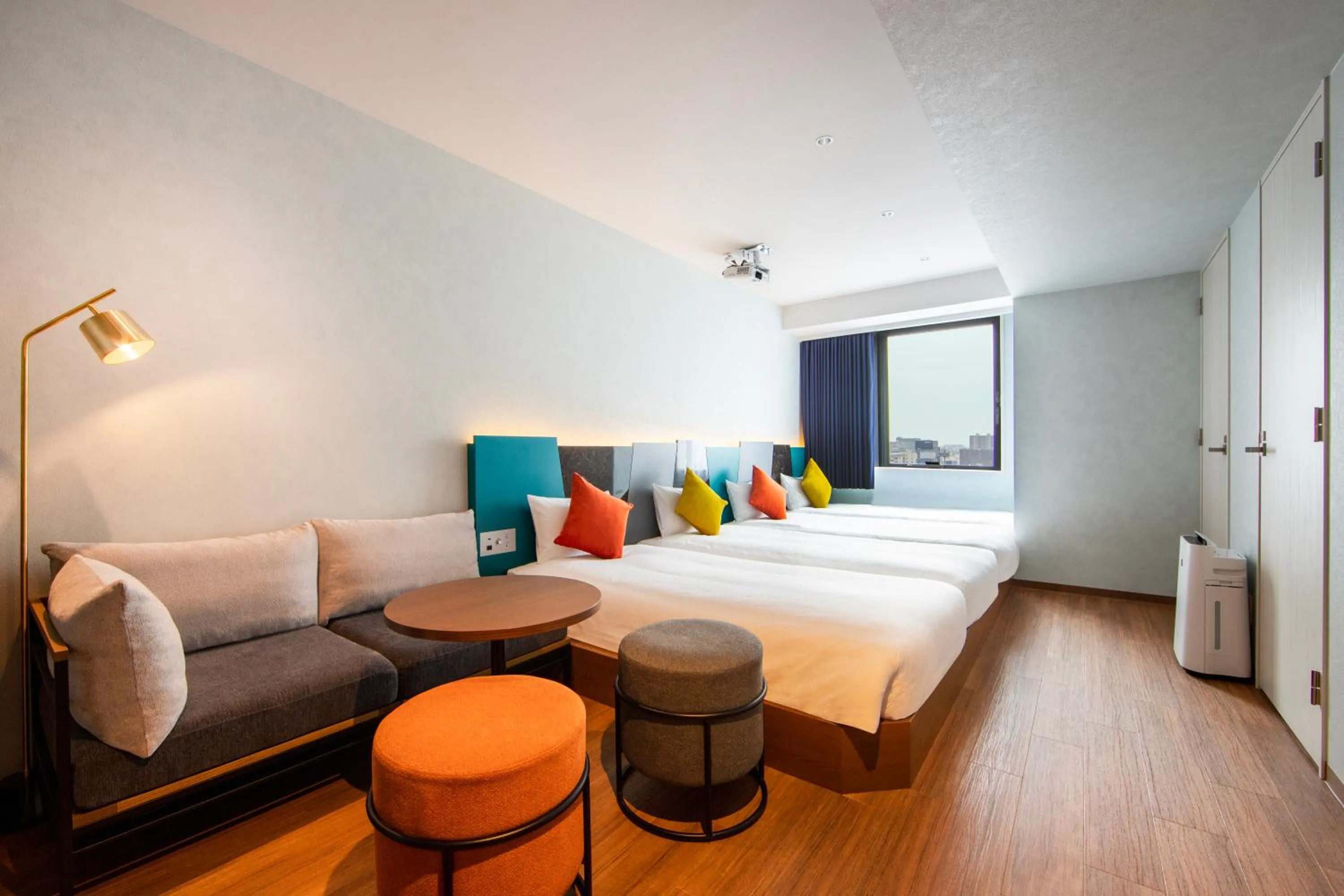 Living room, Bed in karaksa hotel colors Tokyo Yaesu