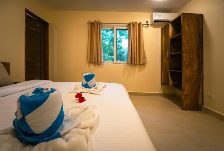 Bed in Antique Amor Bungalows & Villas