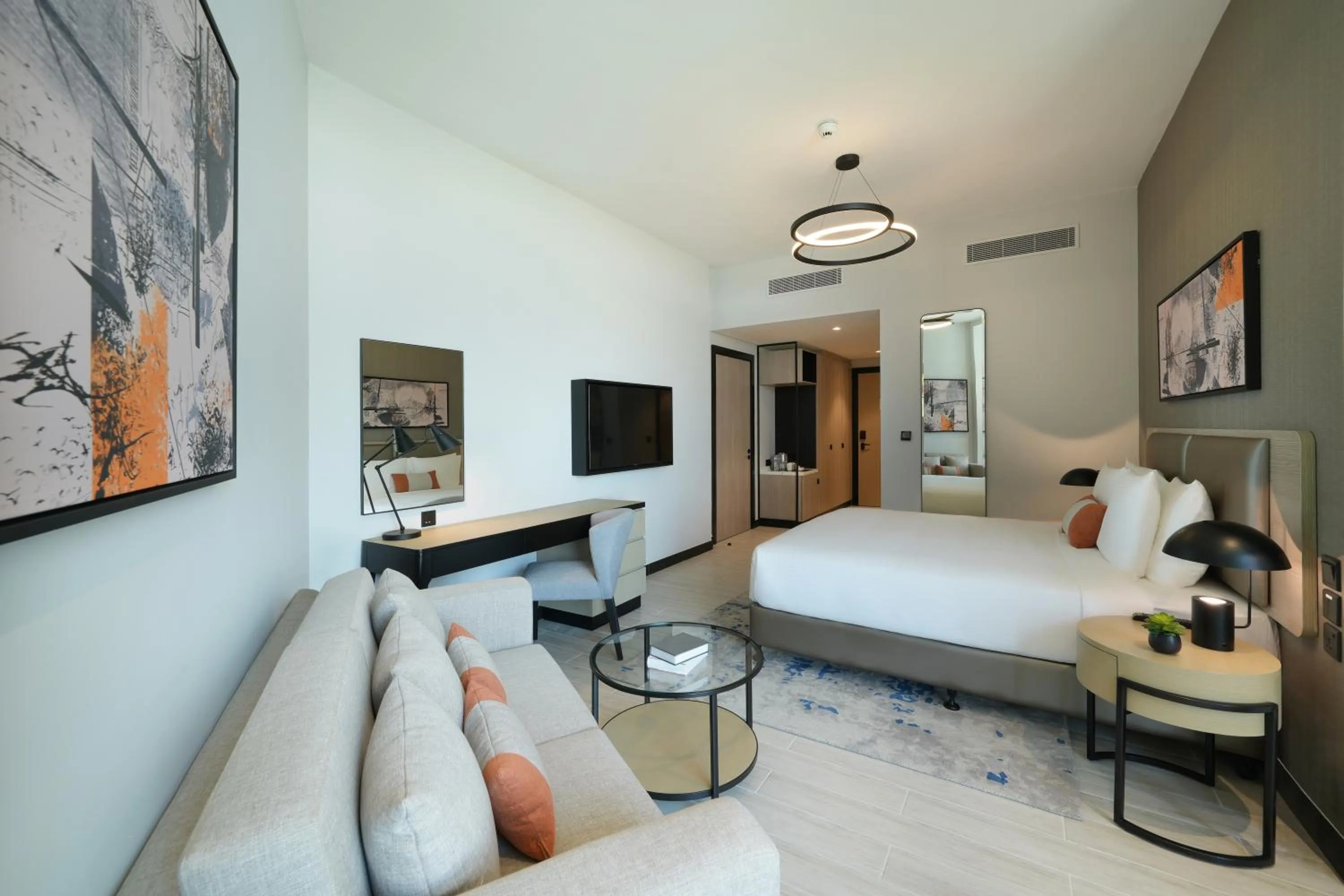 Bed in DAMAC Hills 2 Hotel, an Edge by Rotana Hotel