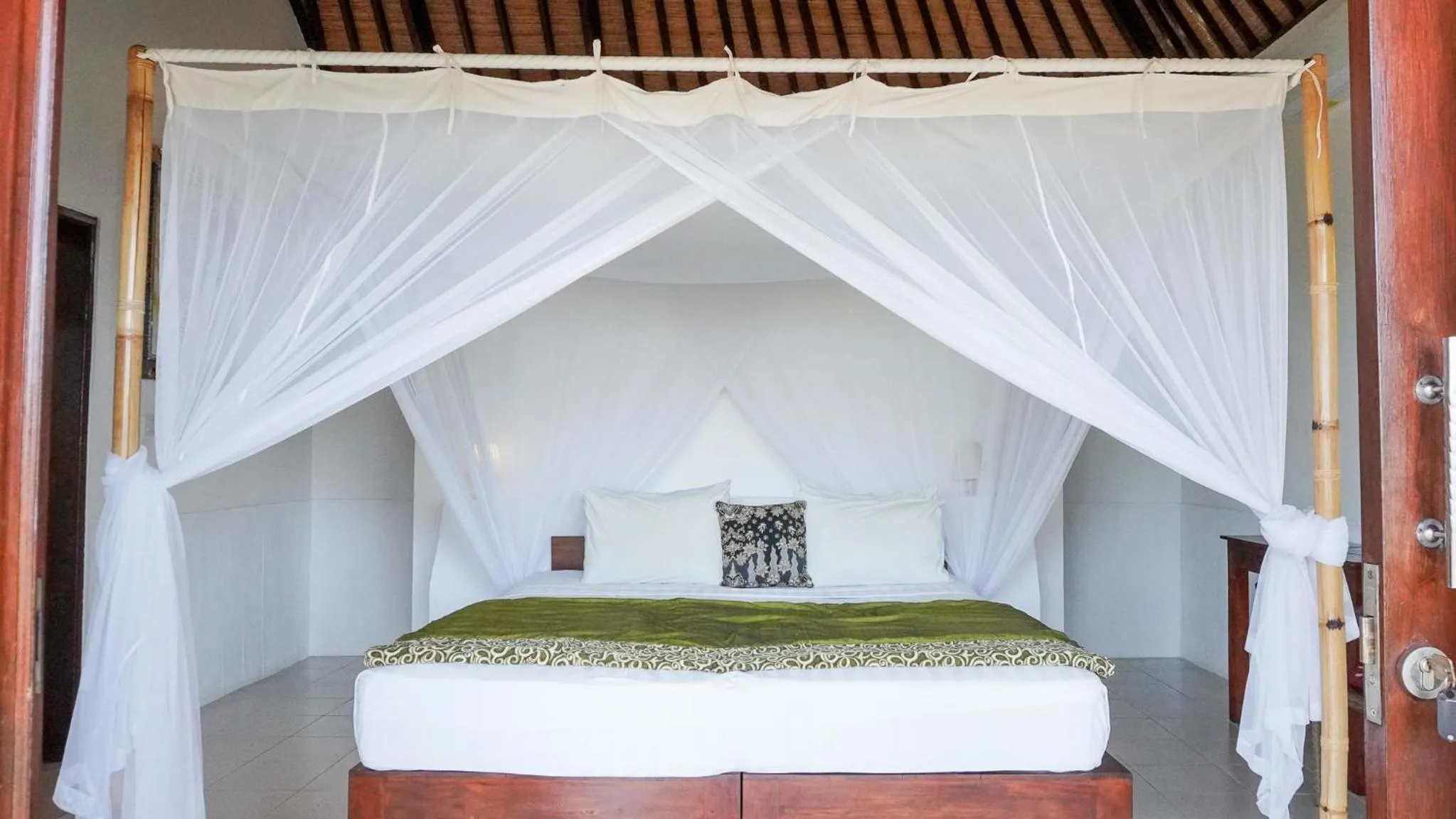 Bed in Anda Amed Villas & Spa