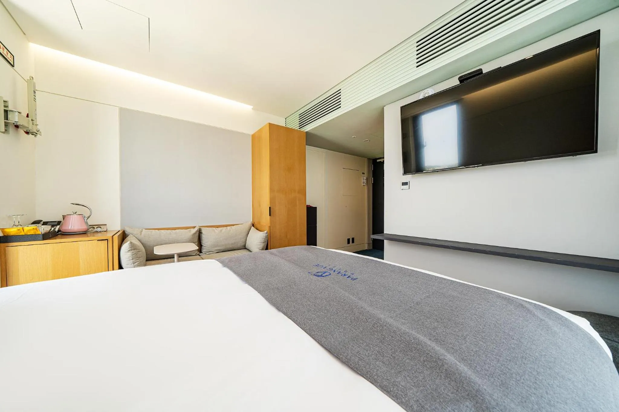 Bed in Hotel Parangvue