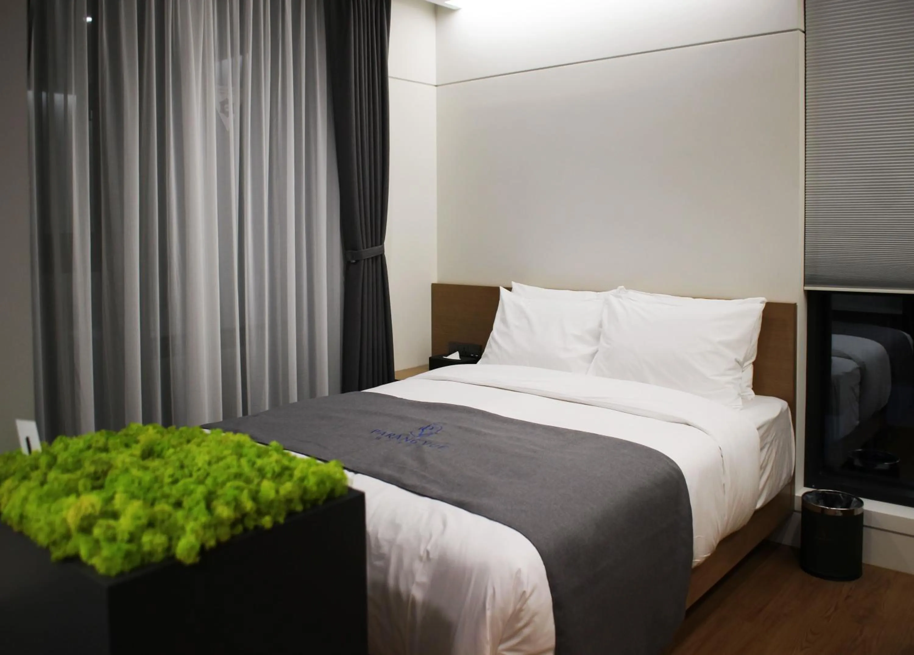 Bed in Hotel Parangvue