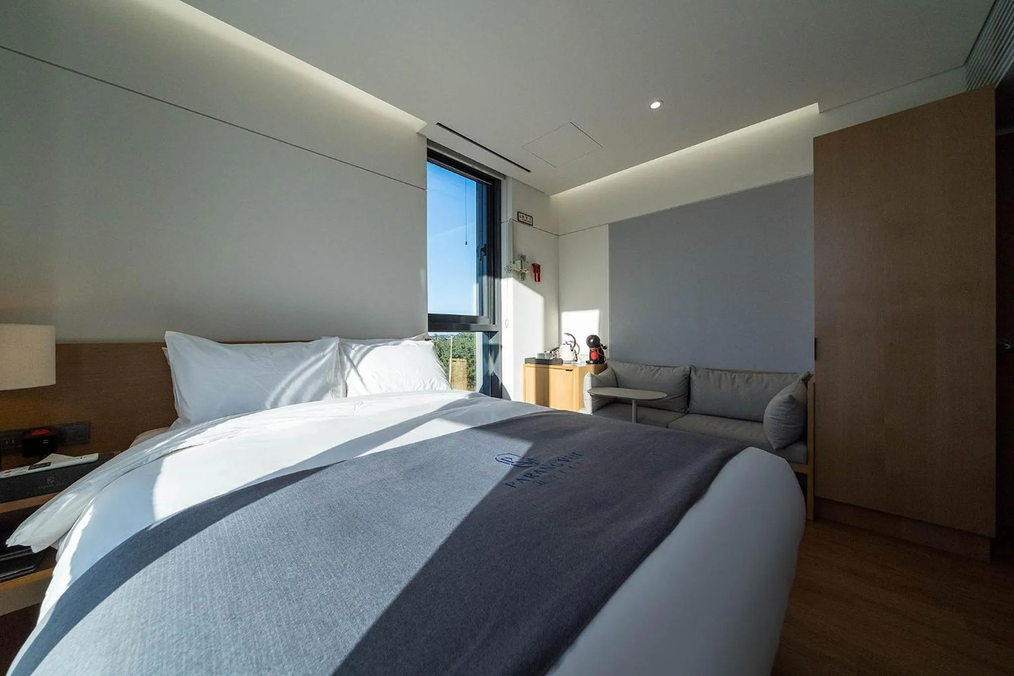 Bed in Hotel Parangvue