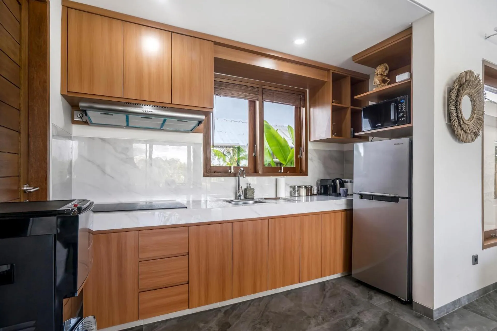 Kitchen or kitchenette in Villa Grateful by Alfred in Bali