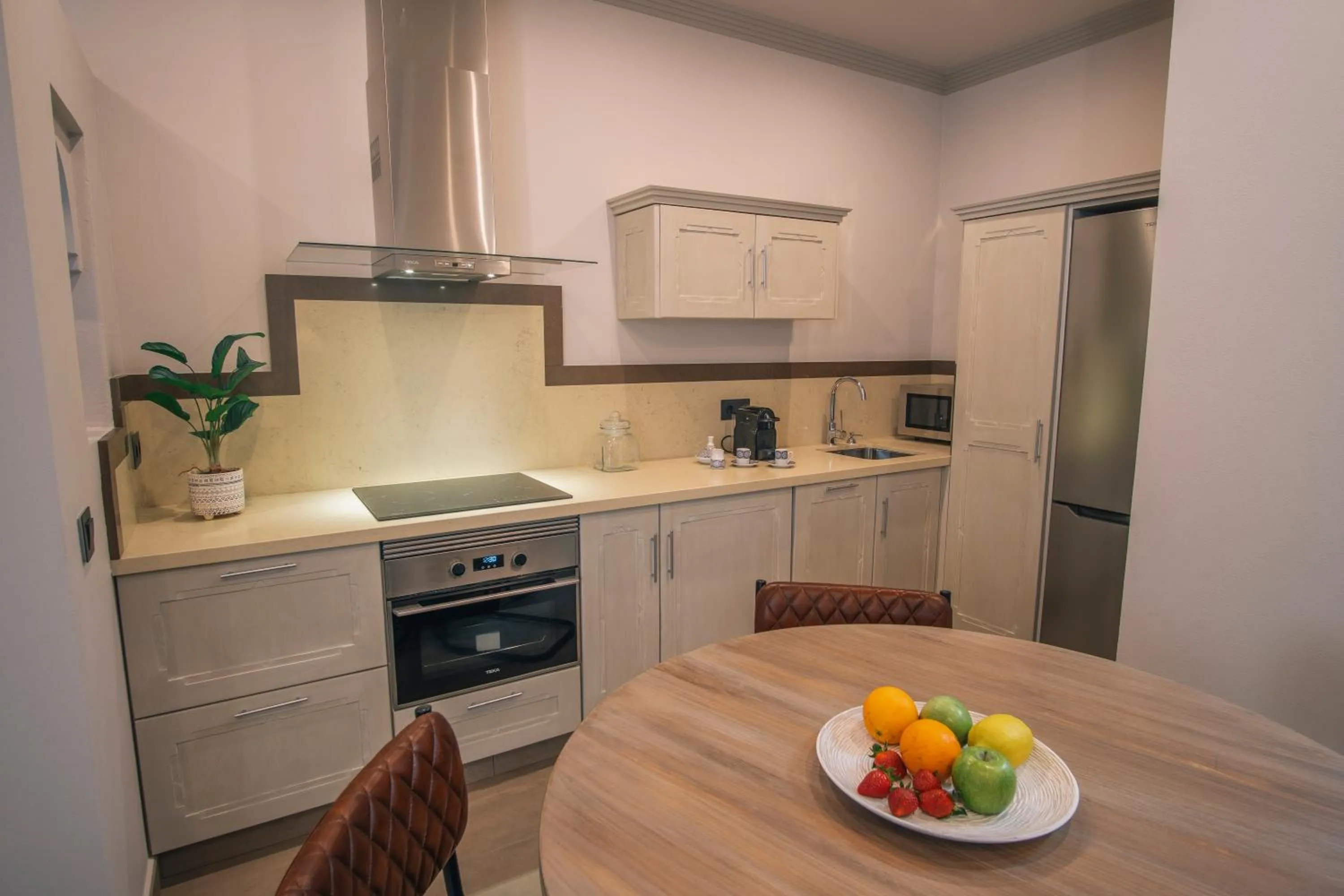 Kitchen or kitchenette in Apartamentos Turísticos La Baílla
