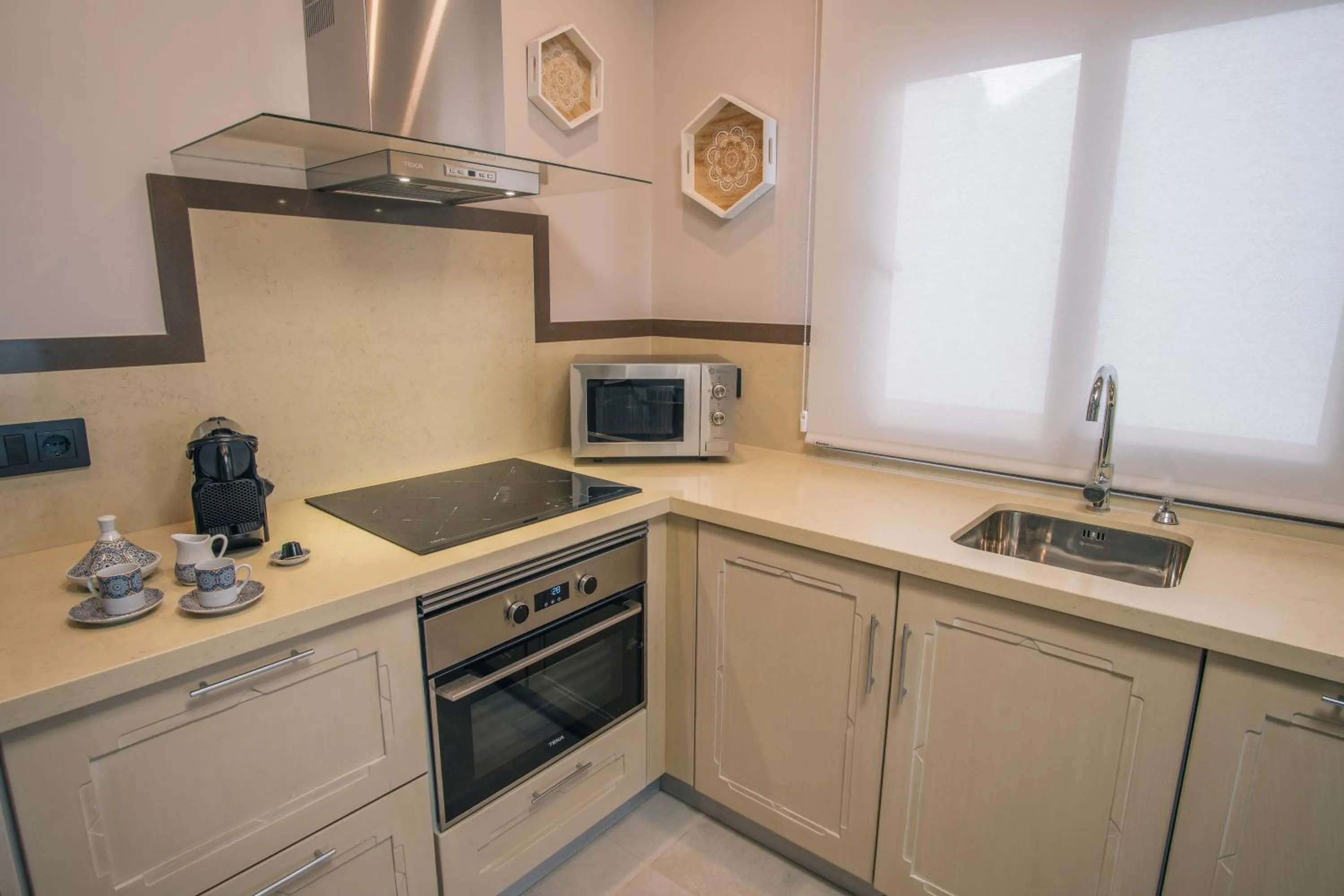 Kitchen or kitchenette in Apartamentos Turísticos La Baílla