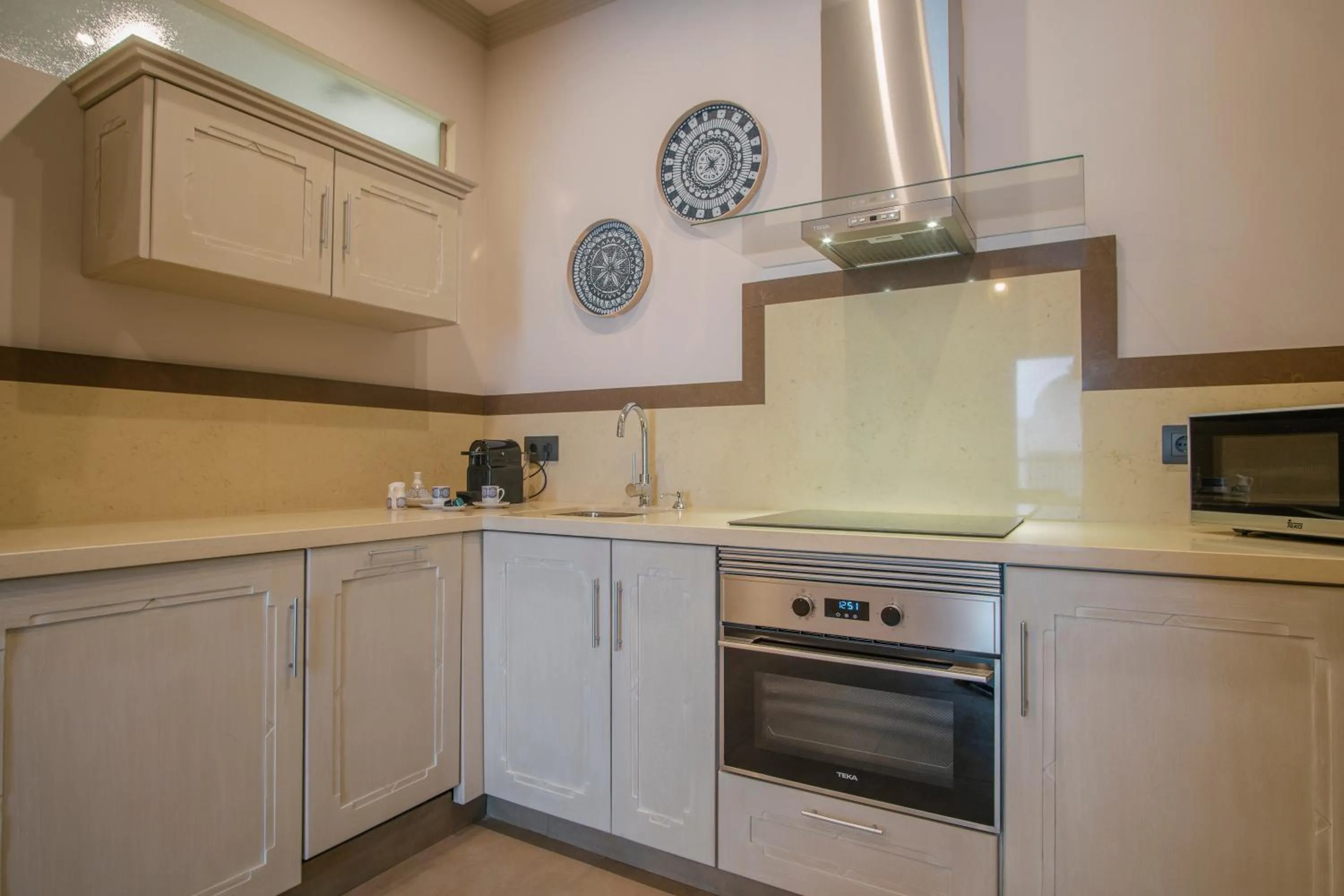 Kitchen or kitchenette in Apartamentos Turísticos La Baílla