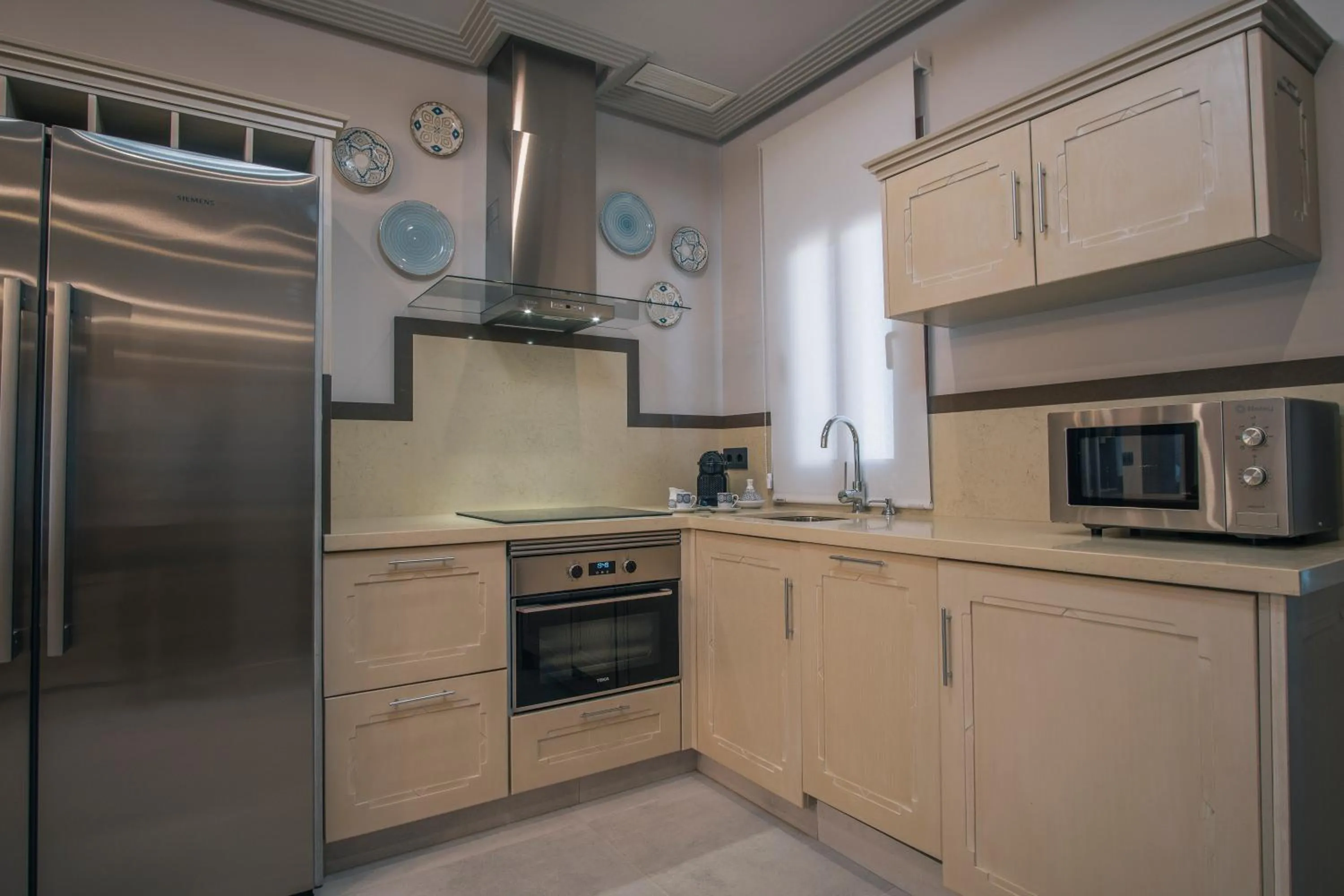 kitchen in Apartamentos Turísticos La Baílla