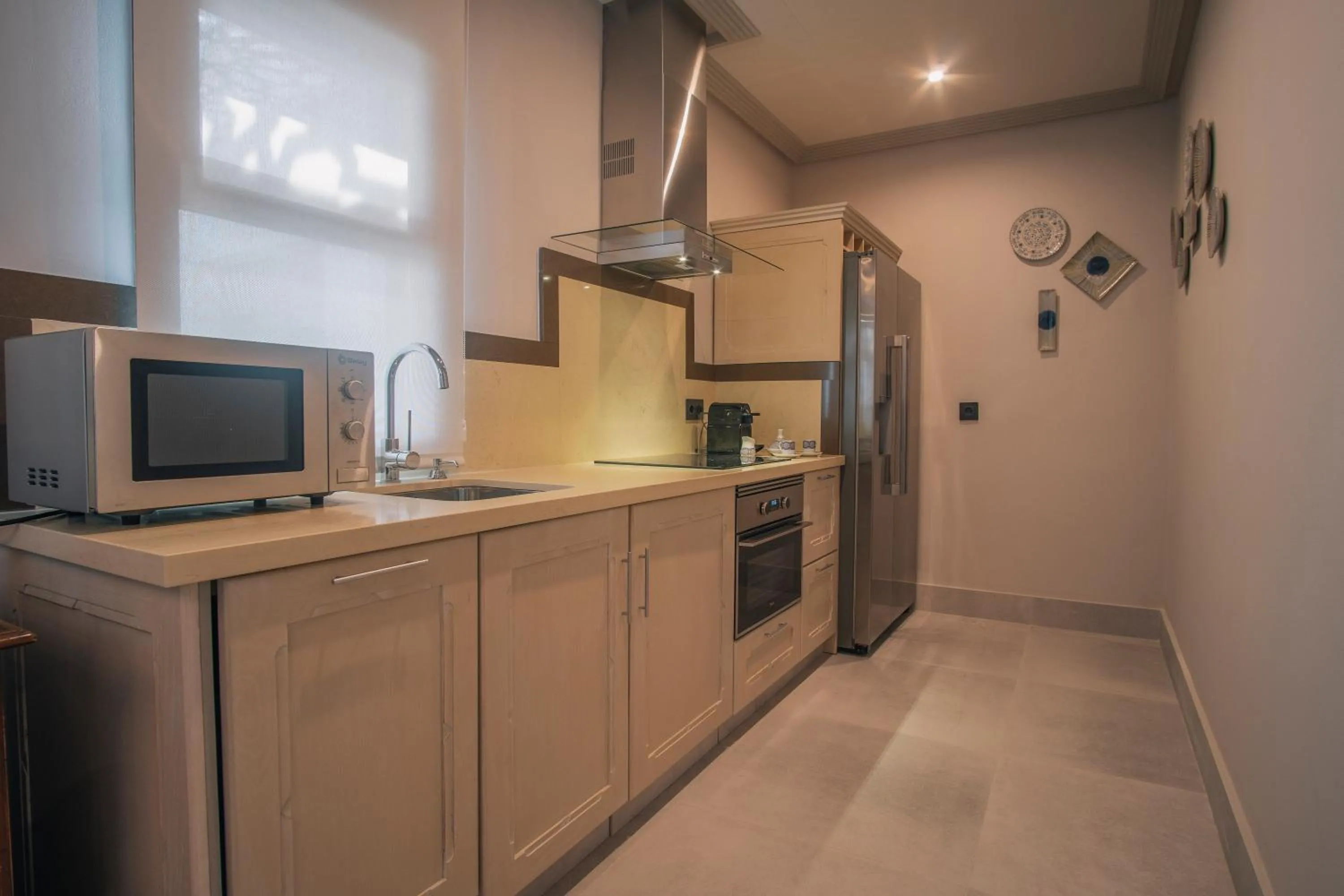 Kitchen or kitchenette in Apartamentos Turísticos La Baílla