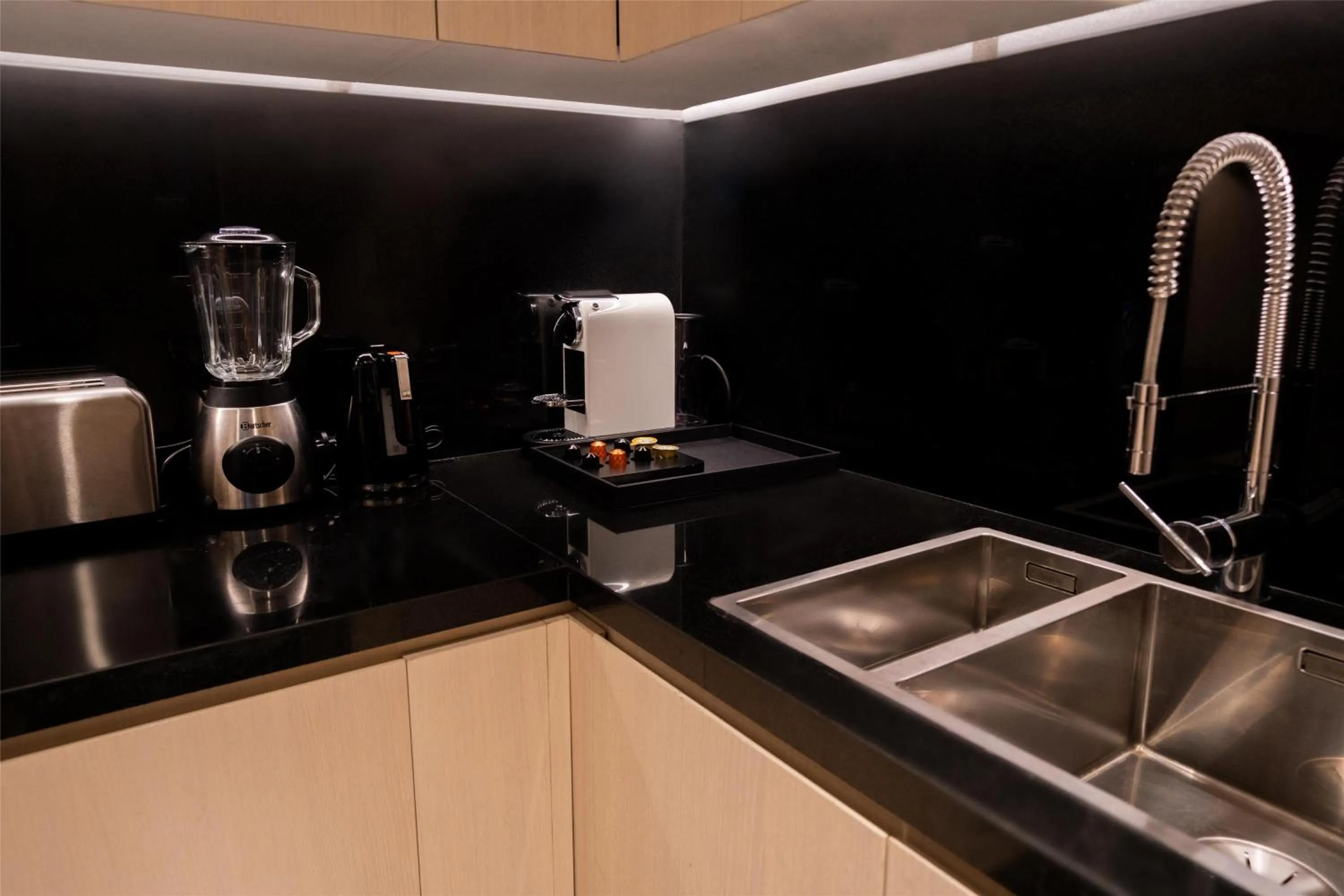 Kitchen or kitchenette in Waldorf Astoria Doha West Bay