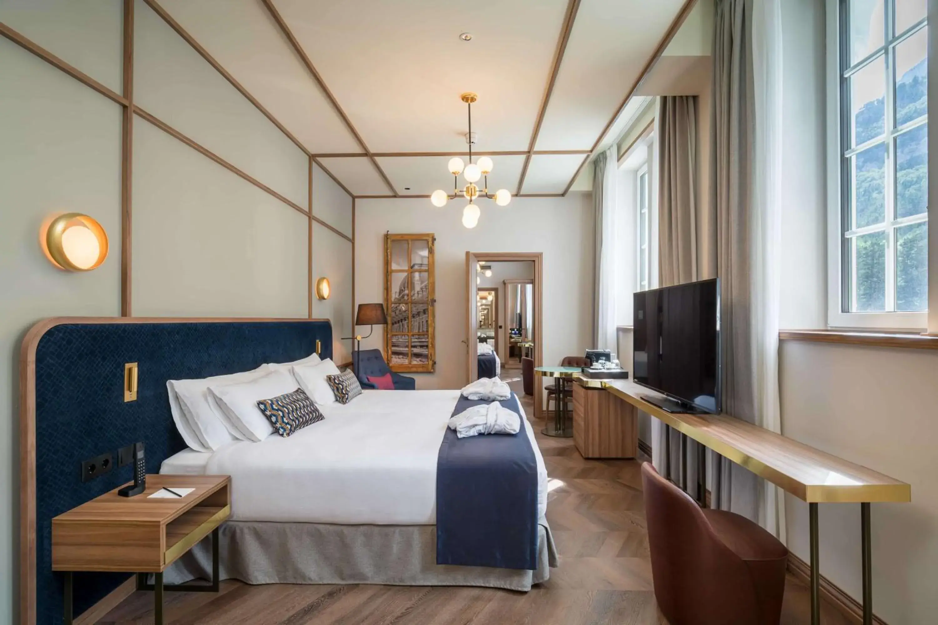Family Room in Canfranc Estación, a Royal Hideaway Hotel - Gran Lujo Family Room in Canfranc Estación, a Royal Hideaway Hotel - Gran Lujo