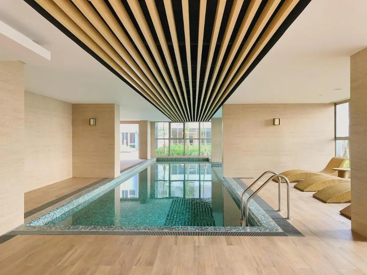 Swimming pool in Gold Coast Apartemen PIK by Dluxx