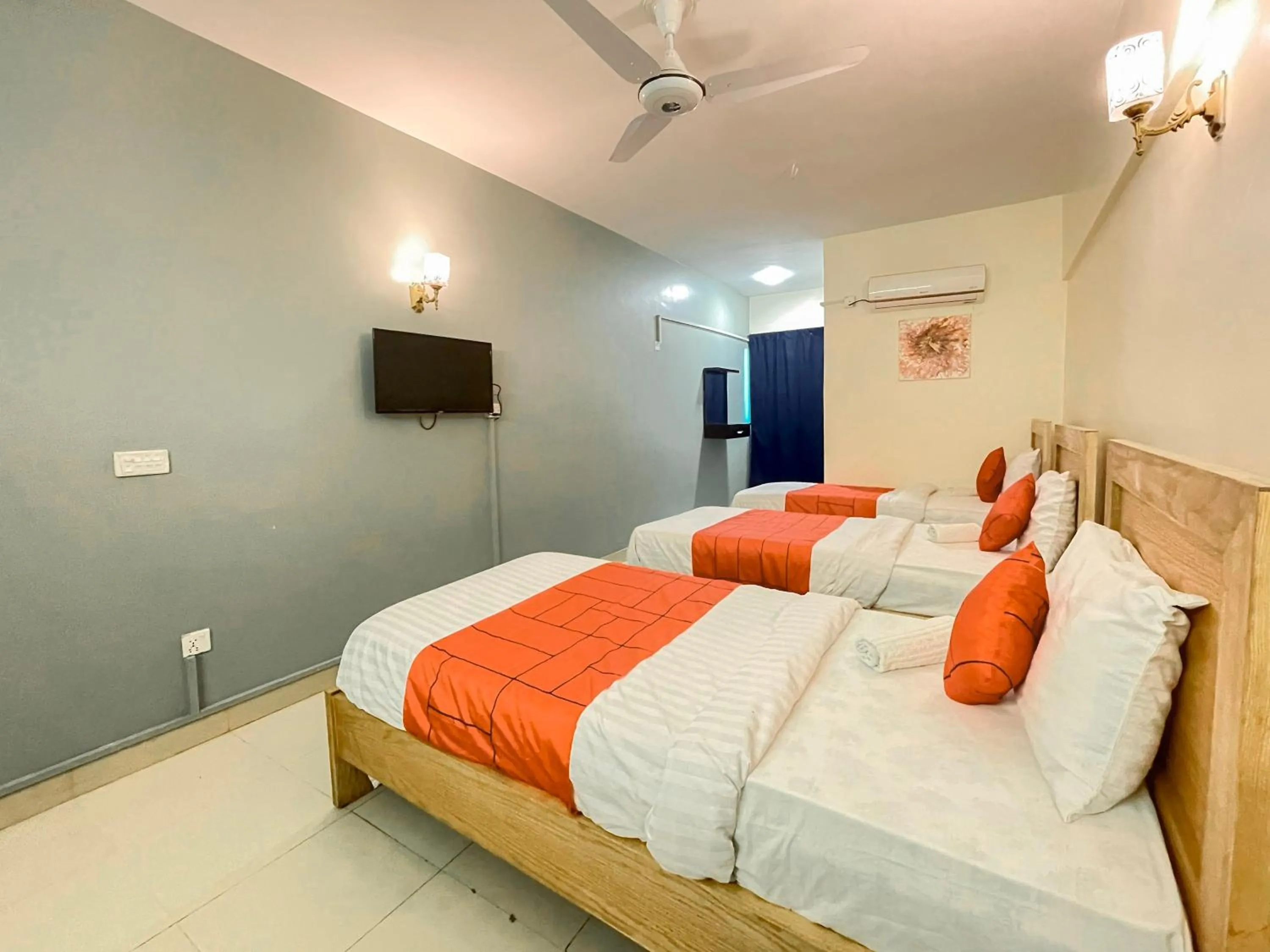 Bed in GOHO Rooms 10th Commercial