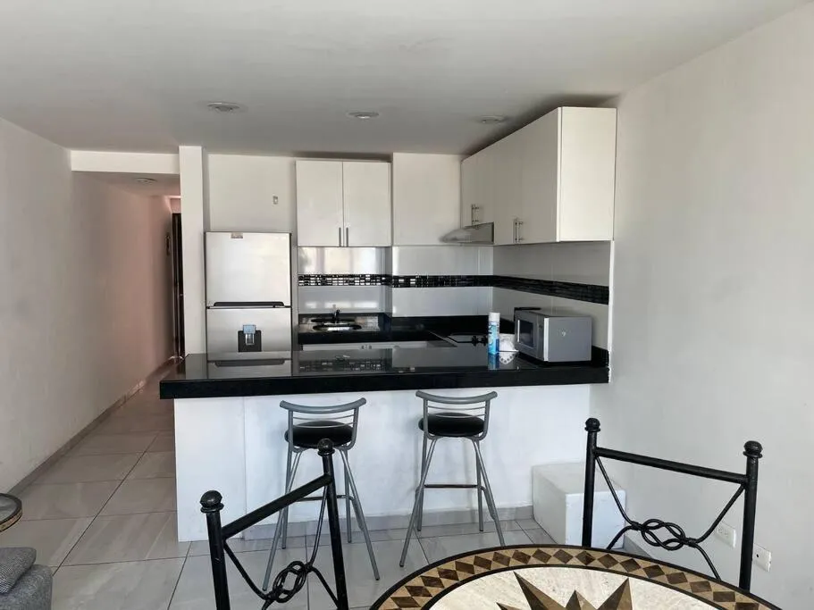 Kitchen or kitchenette in Condo playa cerritos con 2 albercas Mazatlan
