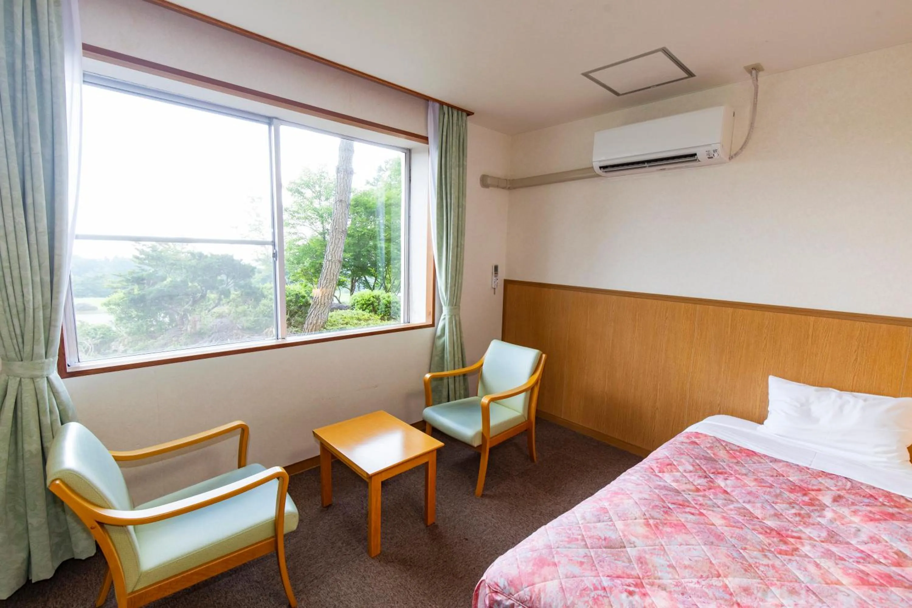 Bed in Kyukamura Chausuyama-Kogen