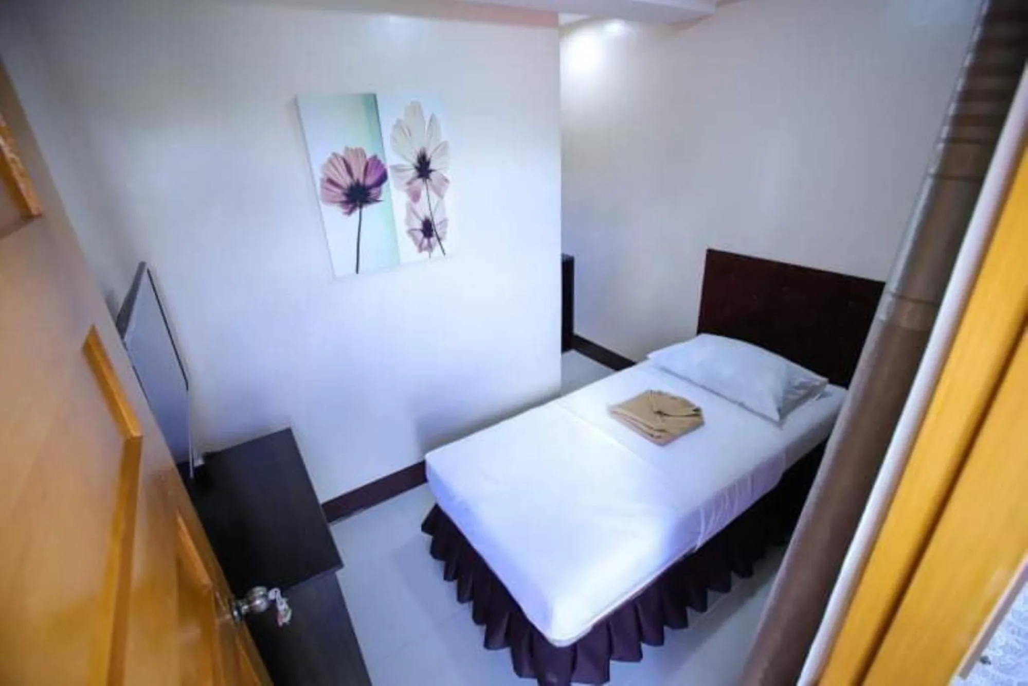 Photo of the whole room, Bed in Marco s Tourist Inn by RedDoorz