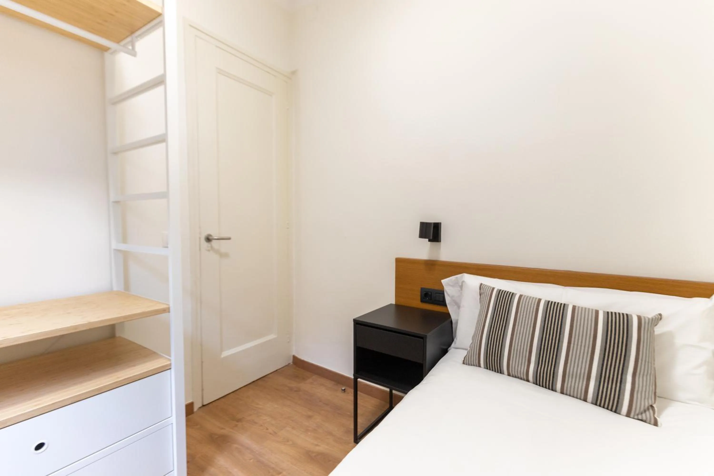 Bed in Atica Apartments - by Weflating