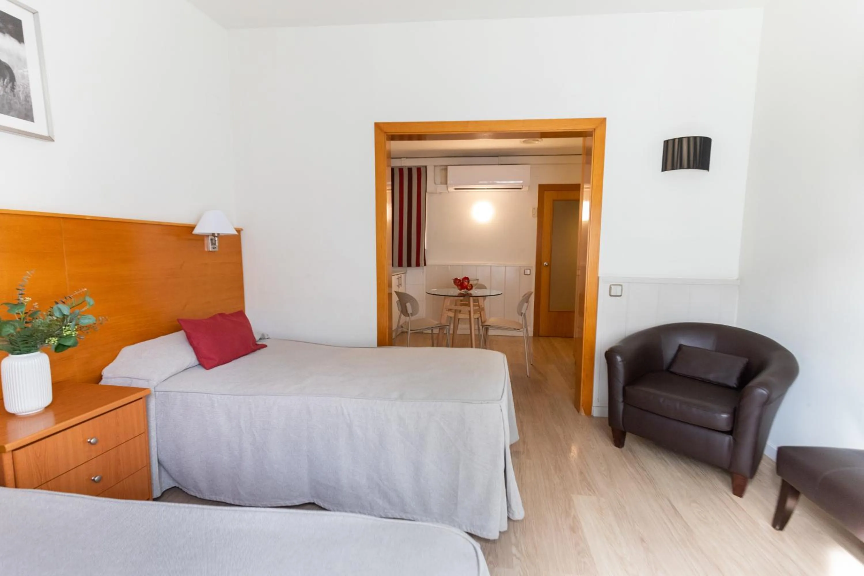 Bed in Atica Apartments - by Weflating