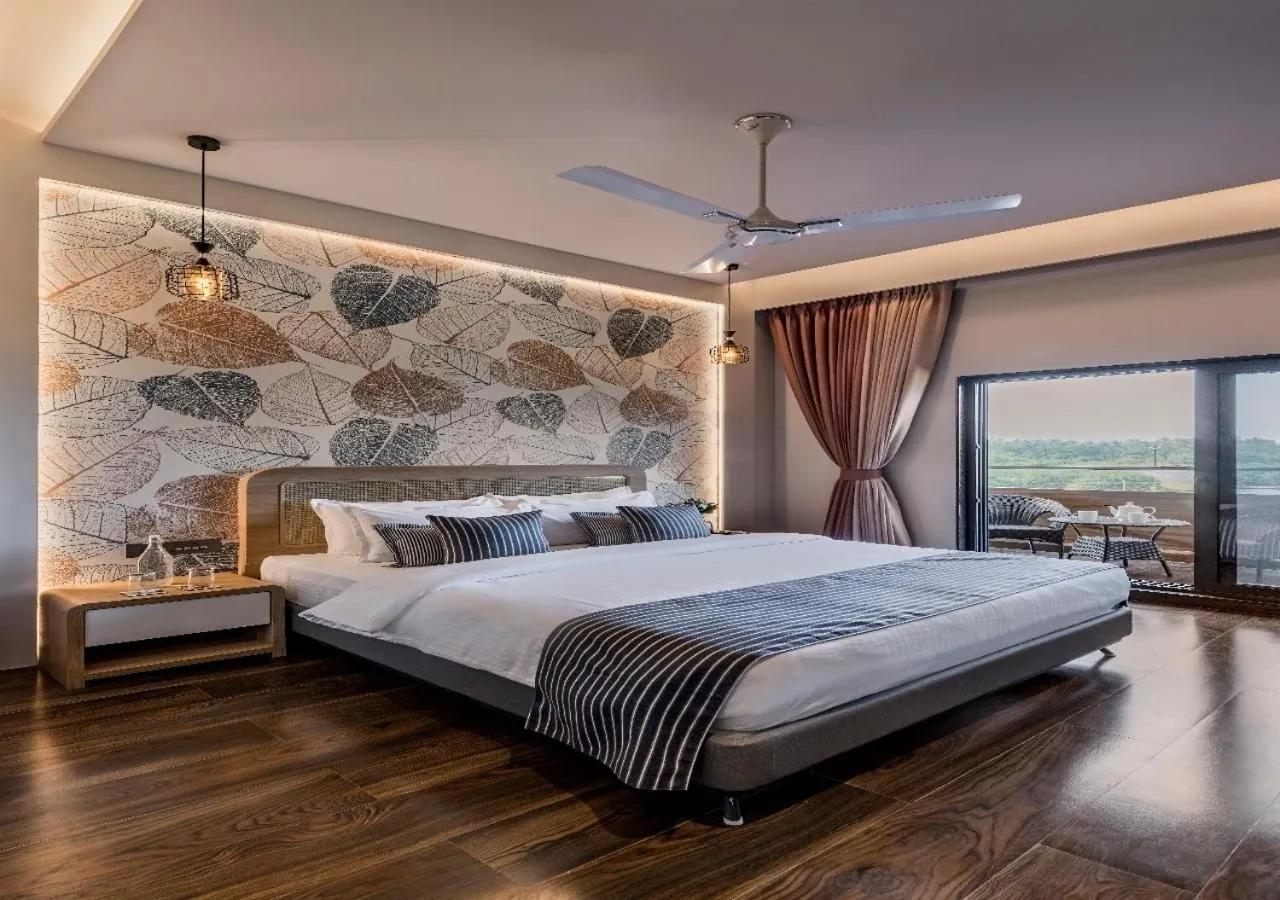 Bed in SaffronStays Nishta - 4BR pet-friendly villa with pool, turf, gazebo & terrace BBQ views in Alibaug
