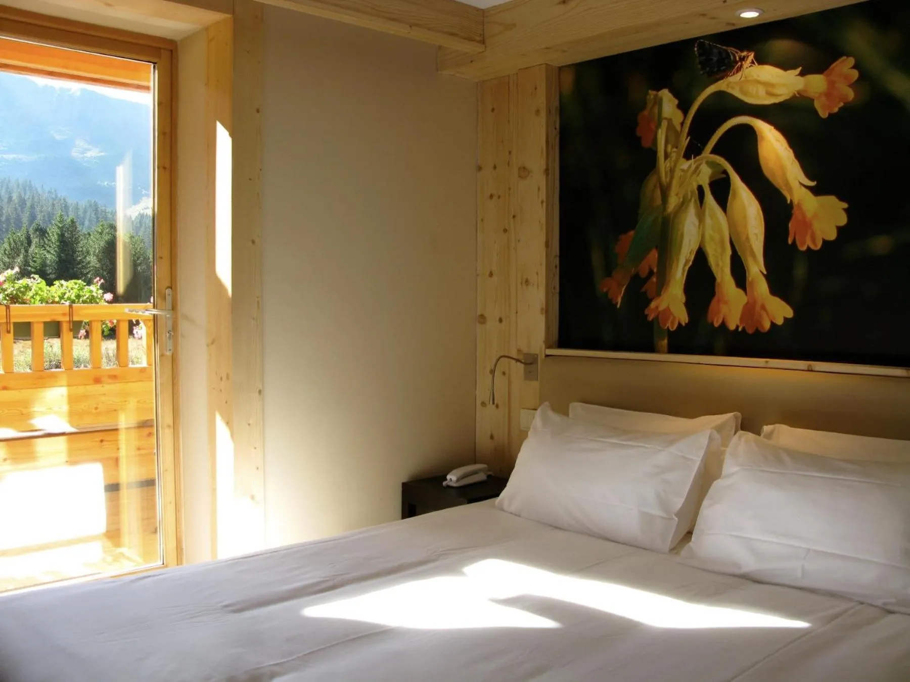 Bed in Logis Chalet Hotel Vaccapark