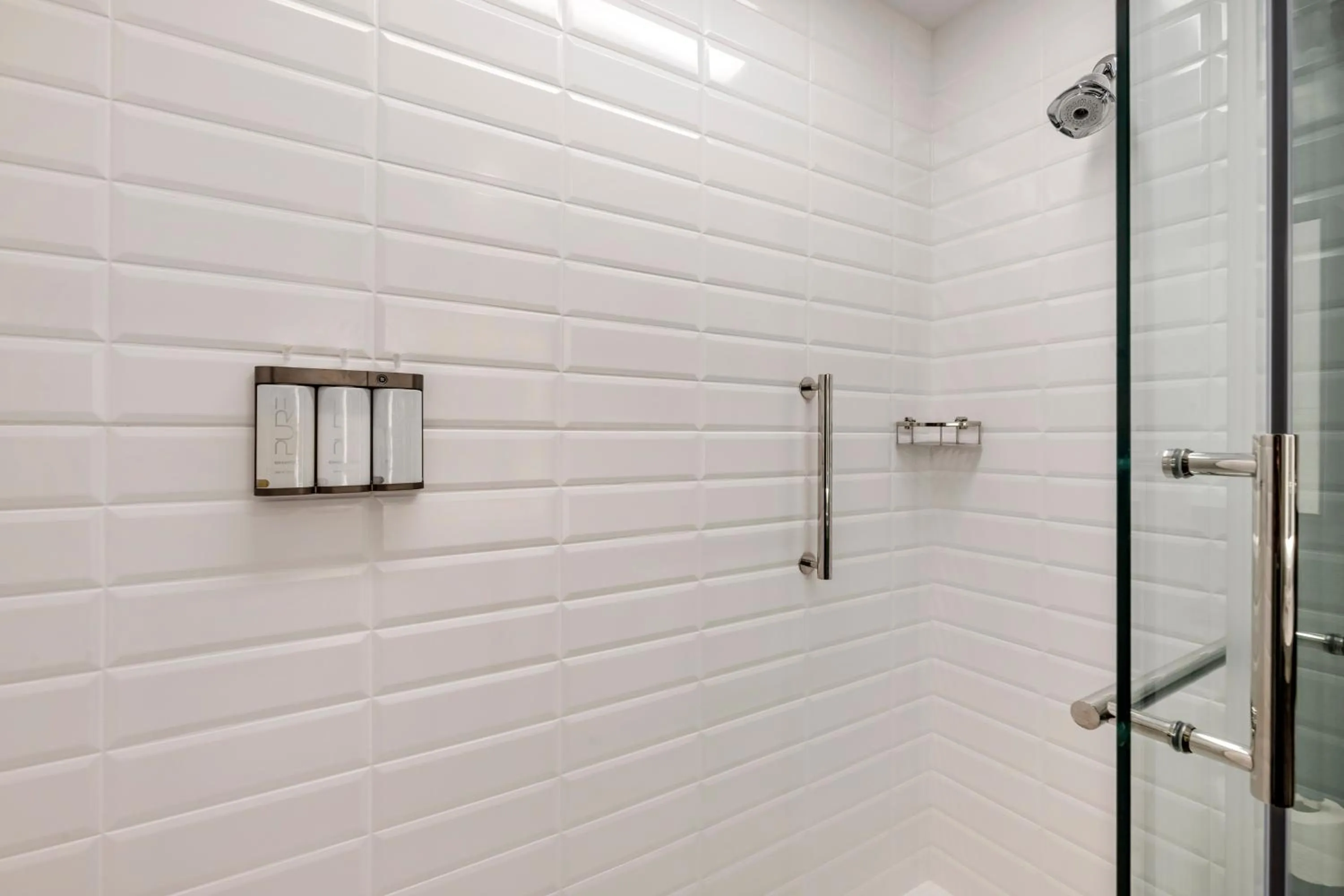 Shower in Cambria Hotel Savannah Downtown Historic District