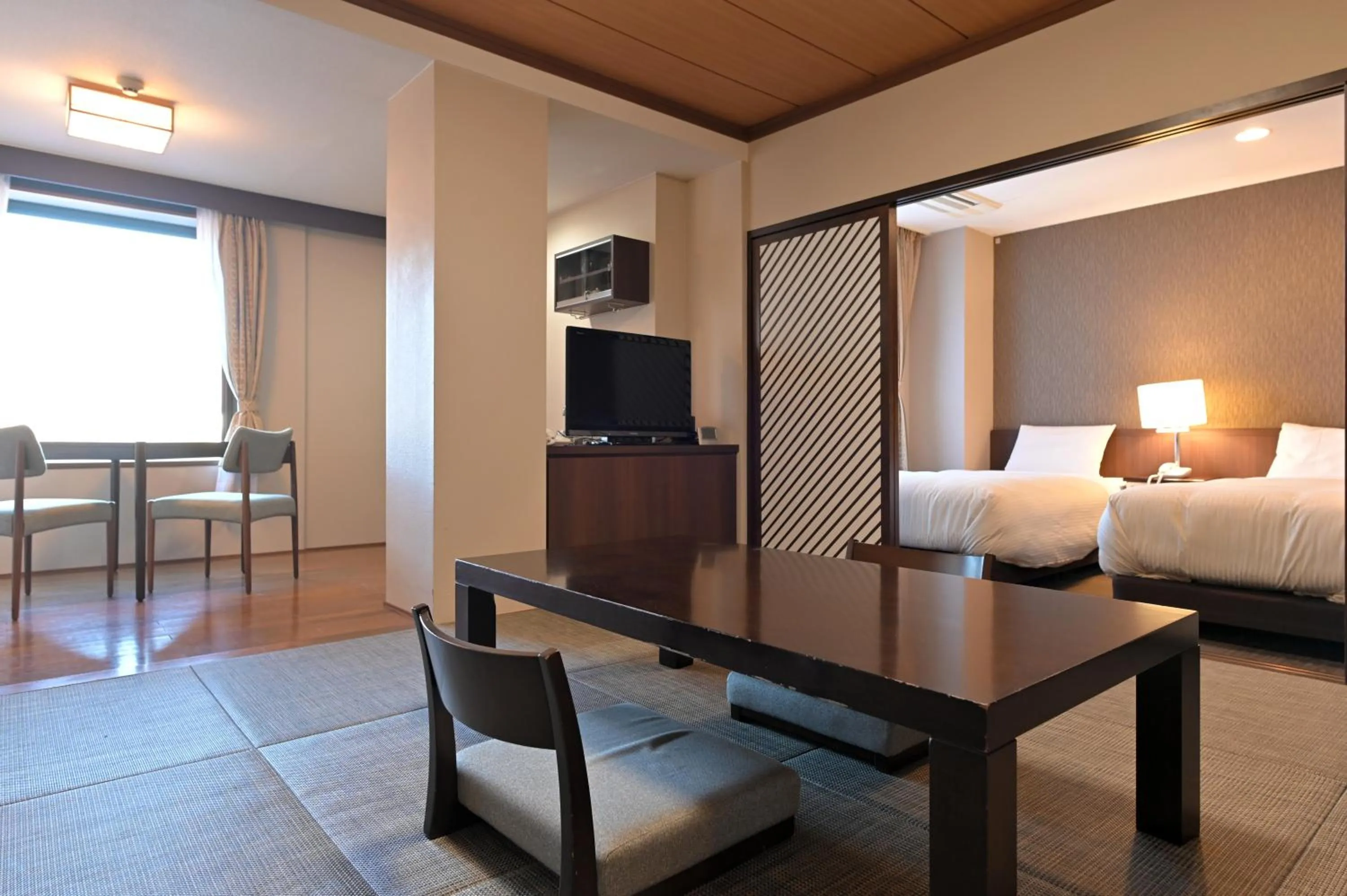 Bed in Kawaguchiko Park Hotel